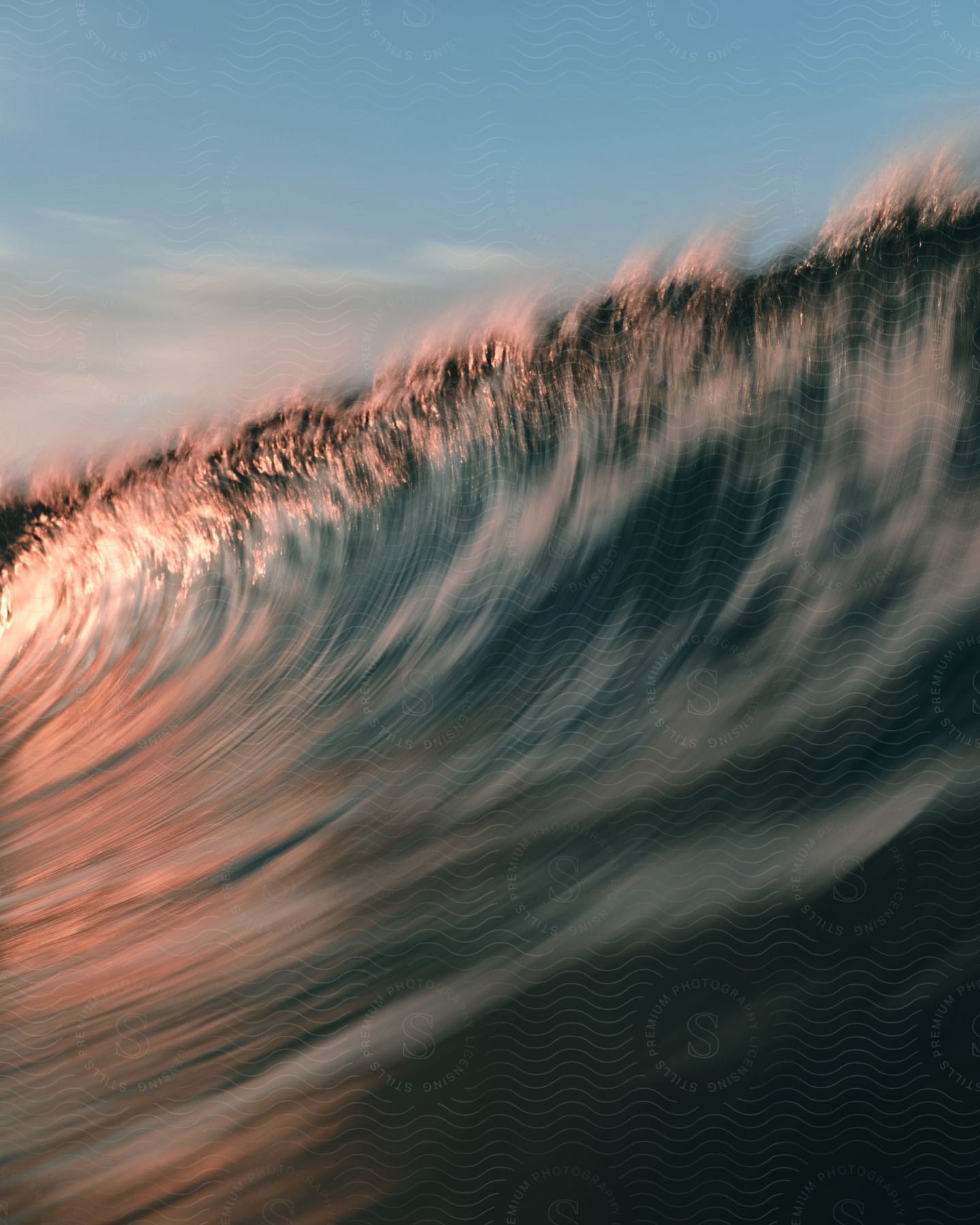 A view of the ocean with waves in it