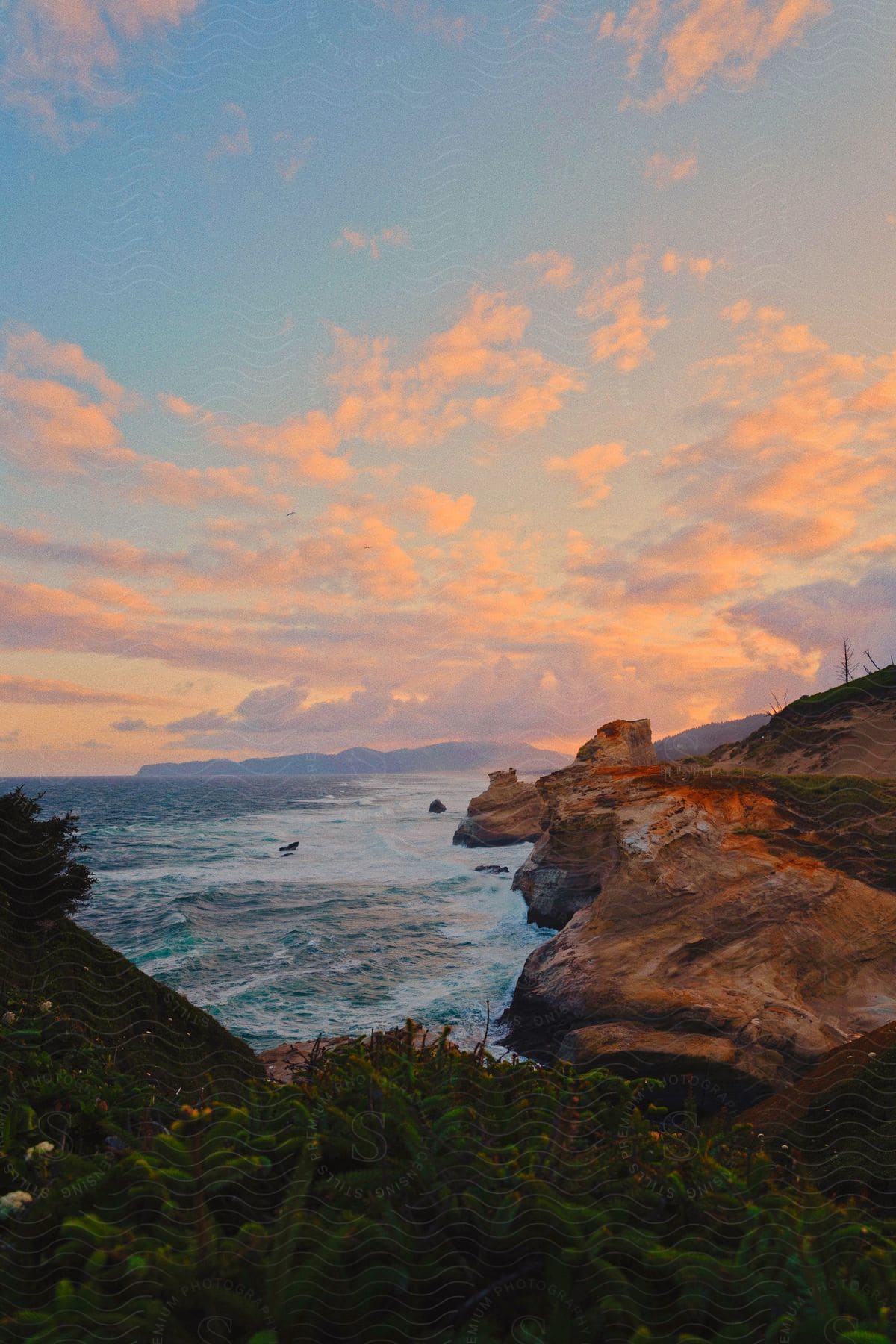 A view of the coast at sunset