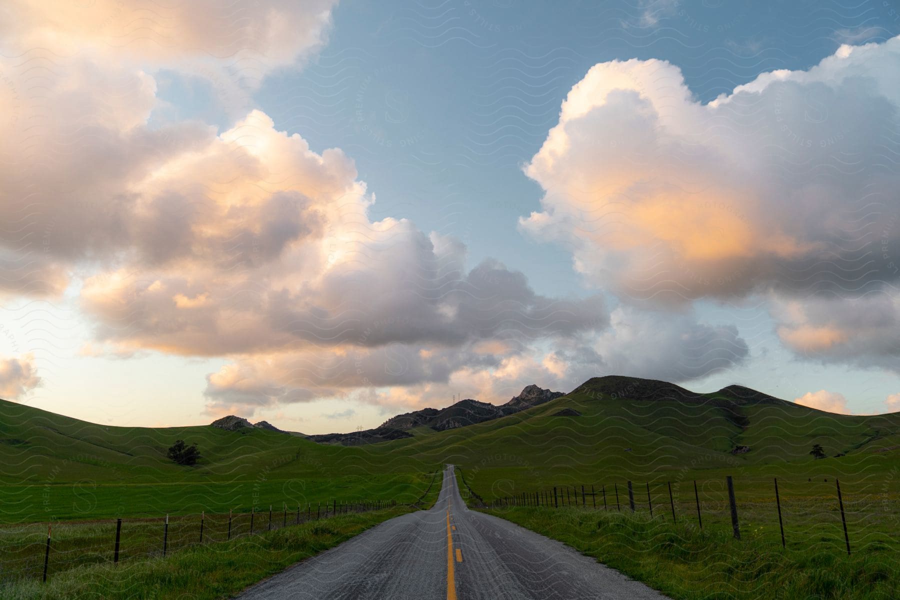 A road running through some hills