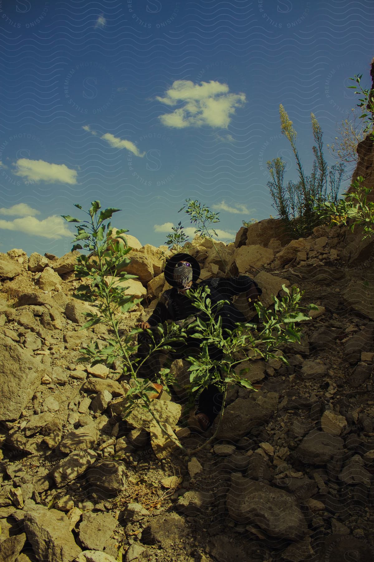 A man sitting outdoors in nature