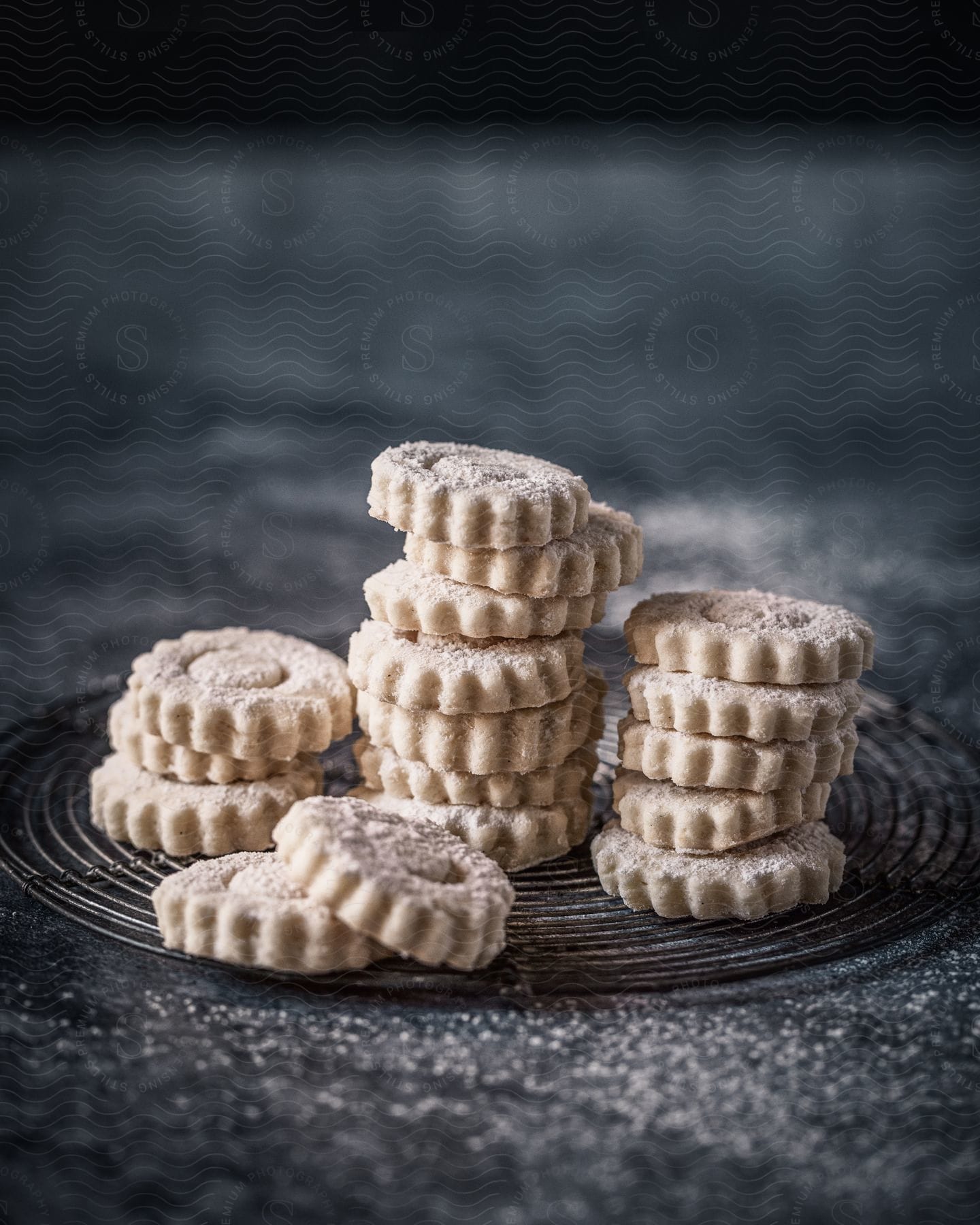 Cookies stacked on a cooling rack