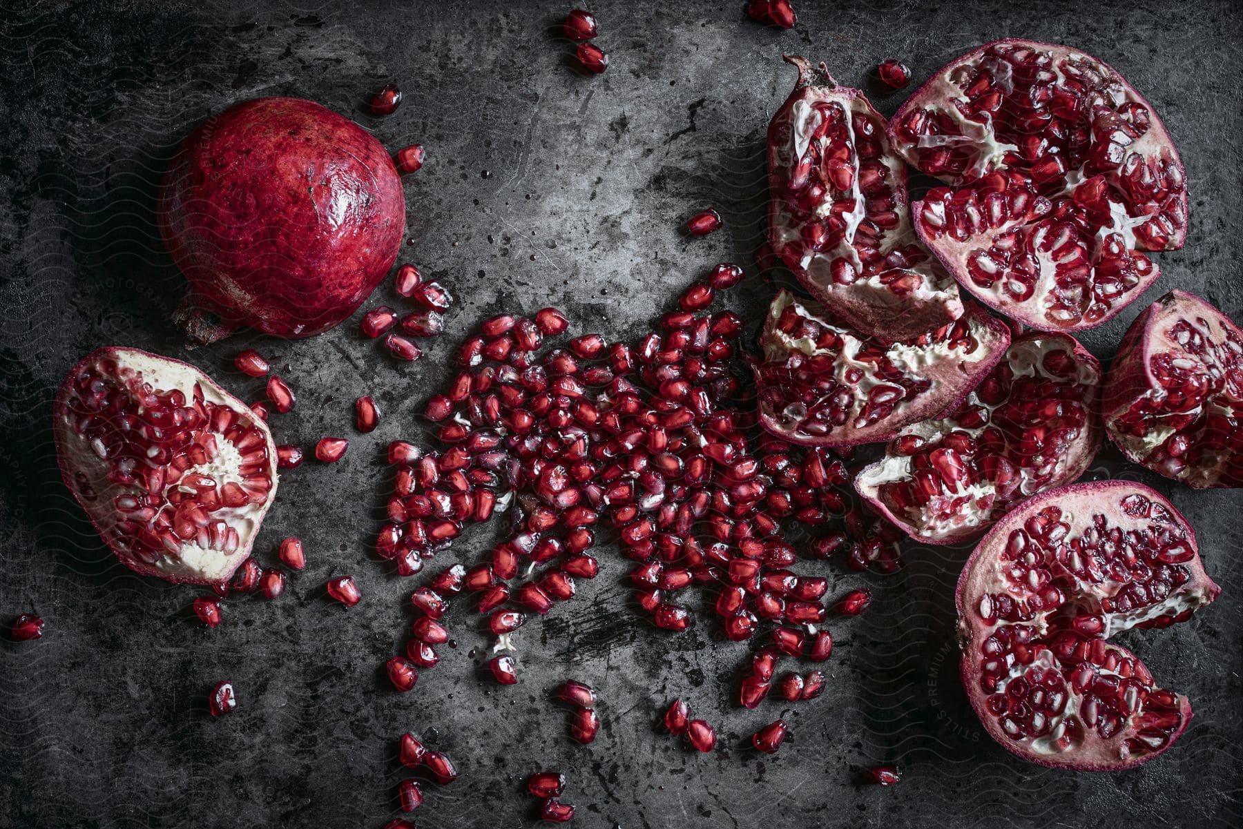 A table with some pomegranates sitting on a table