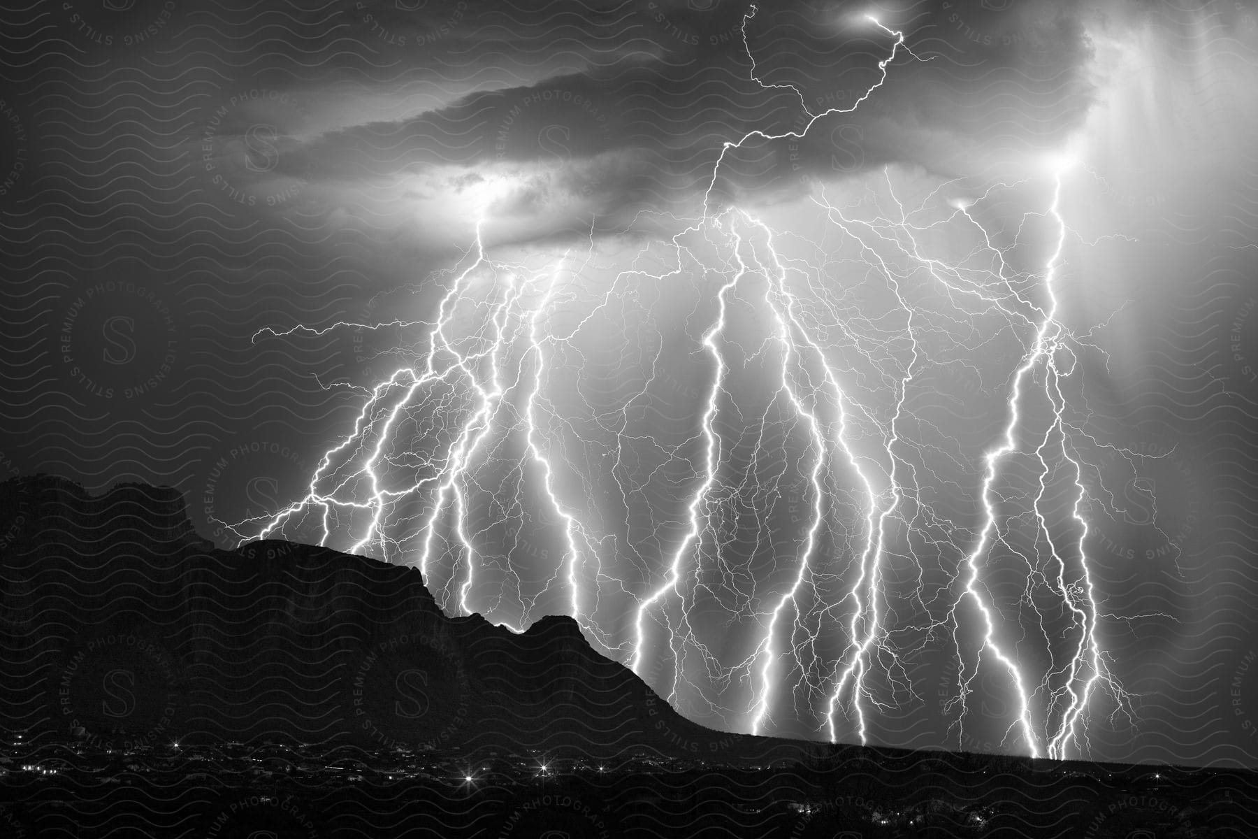 A massive lightning strike hits the superstitions in the early morning