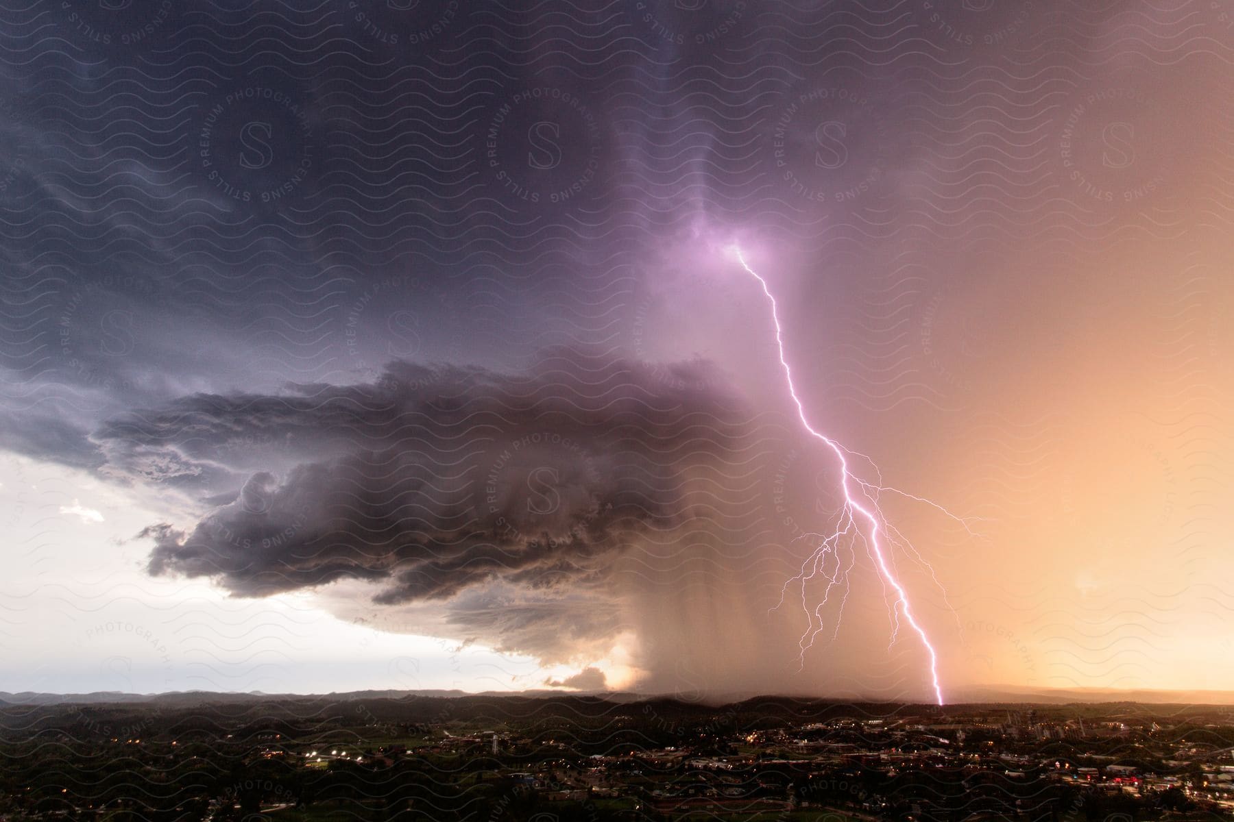 A lightning bolt illuminates the sky during a thunderstorm