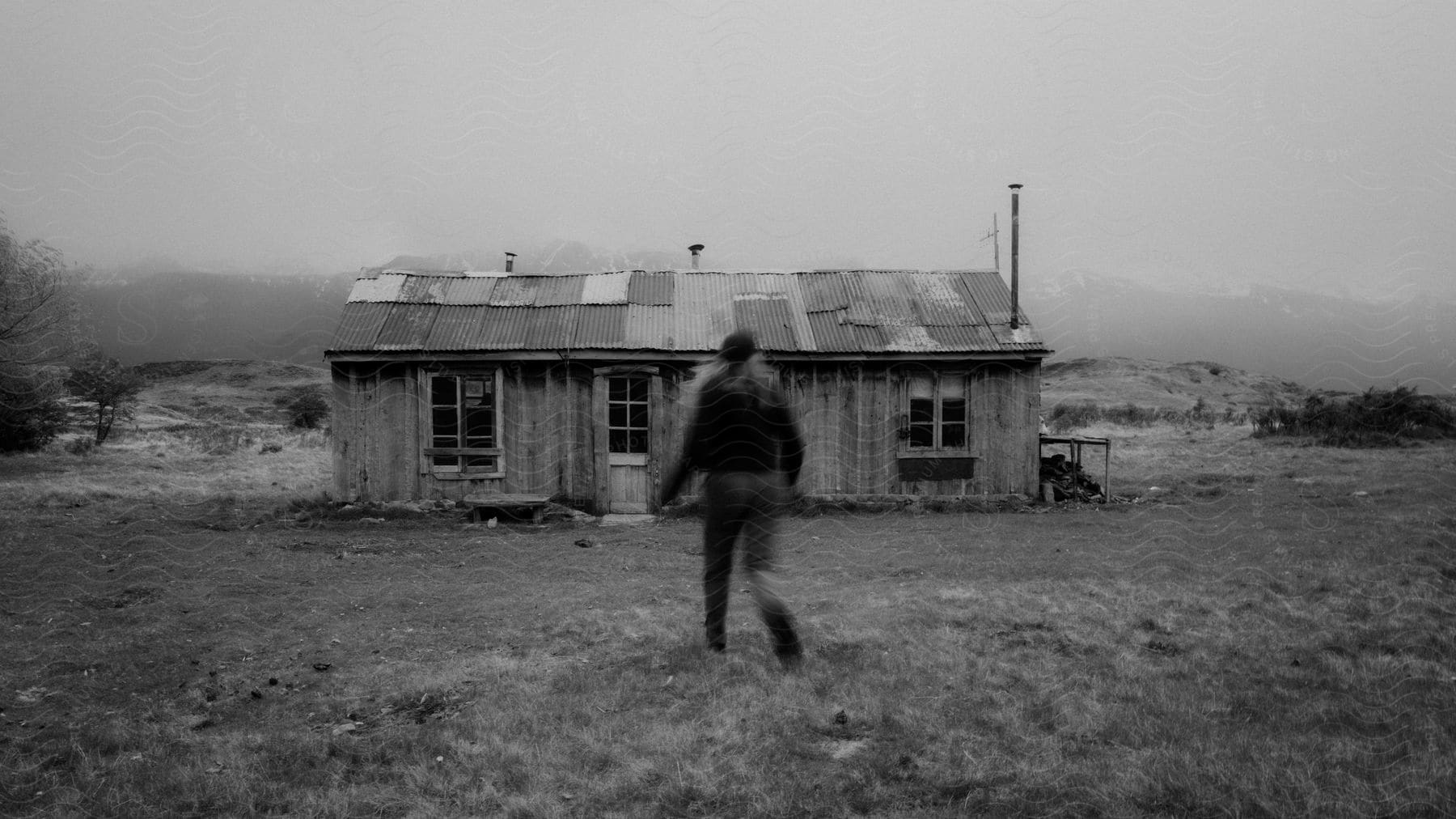 A person in a rural hut in the countryside