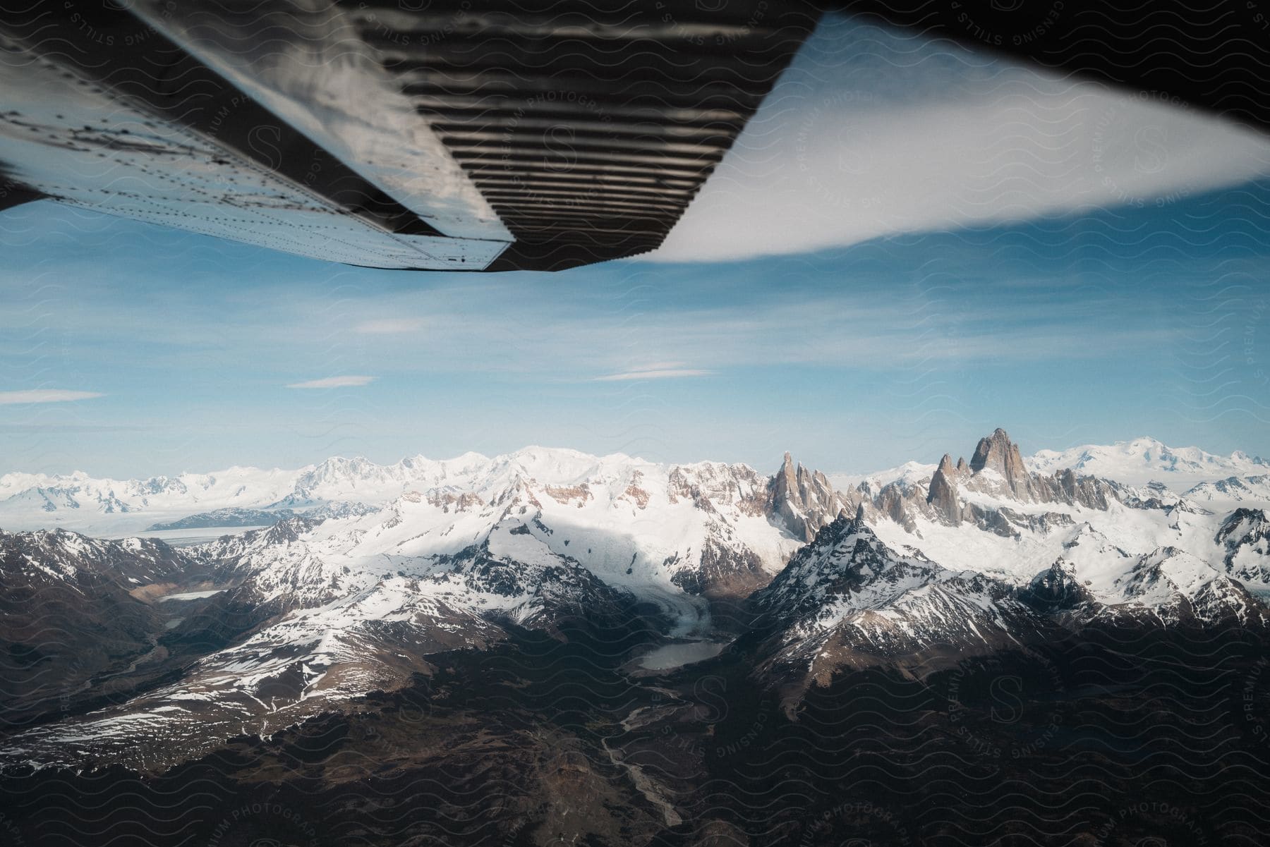 Snowy Mountain Range Seen From Flying Plane Above Patagonia