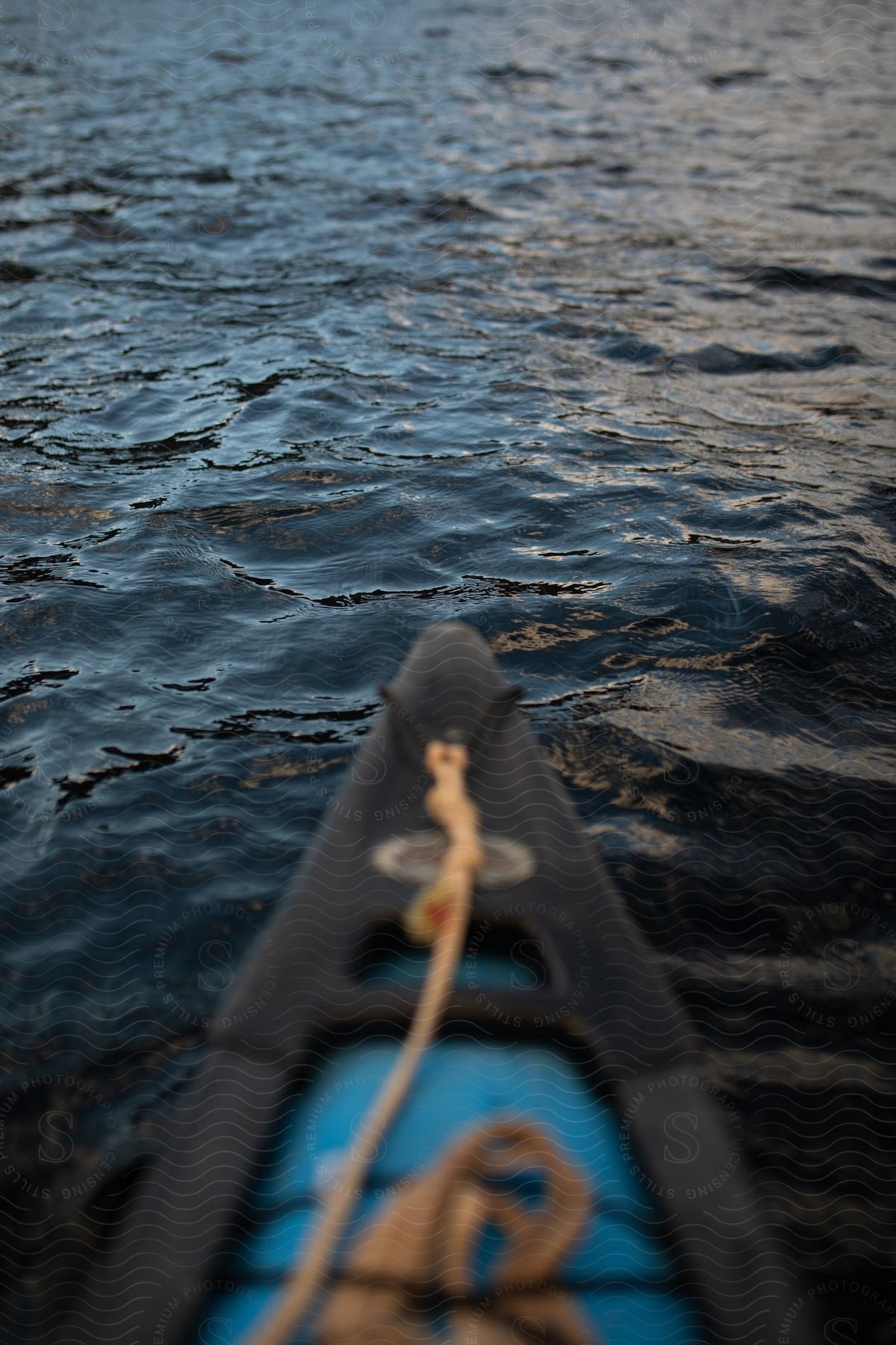 A kayaks prow in the ocean