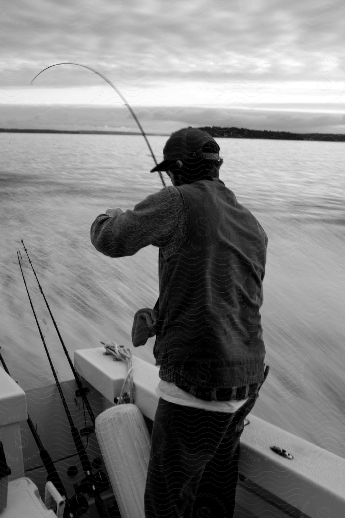 A man fishing on a lake