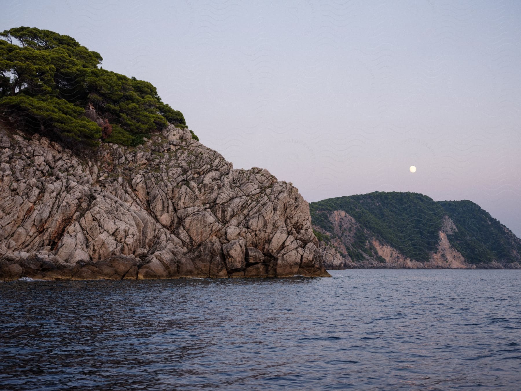 Ocean near rocky mountains in croatia