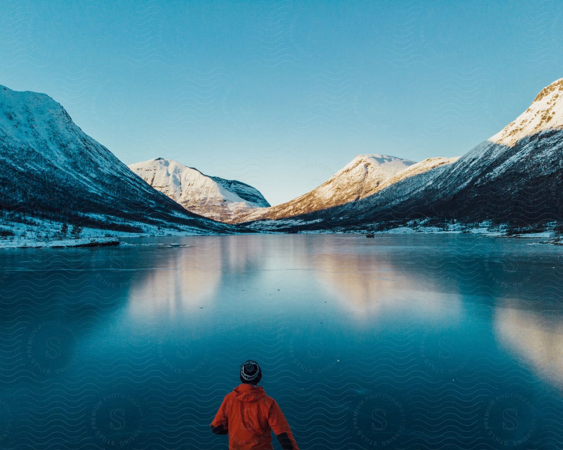 Mountains and a frozen lake in norway during winter