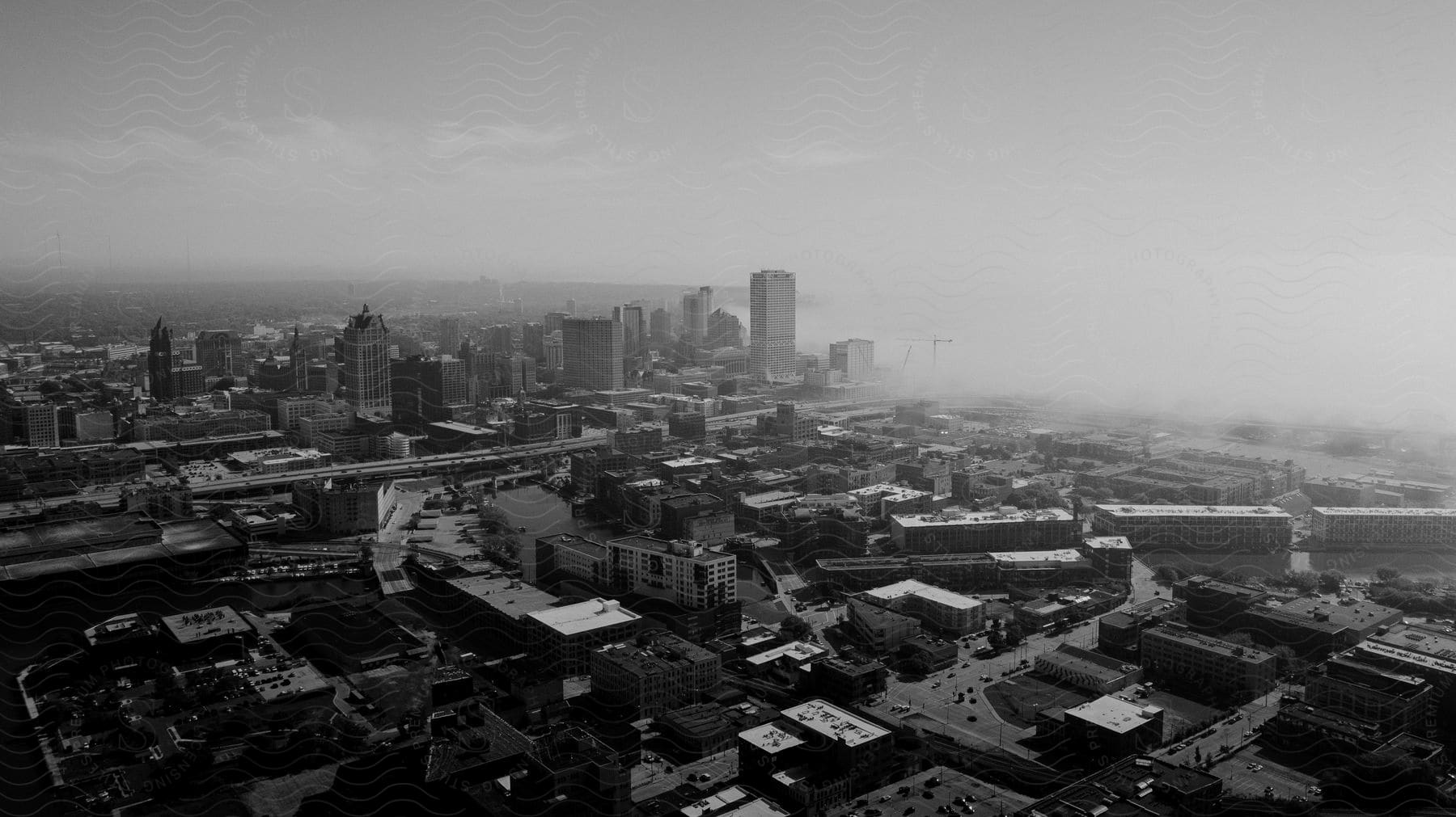 A black and white aerial view of a city