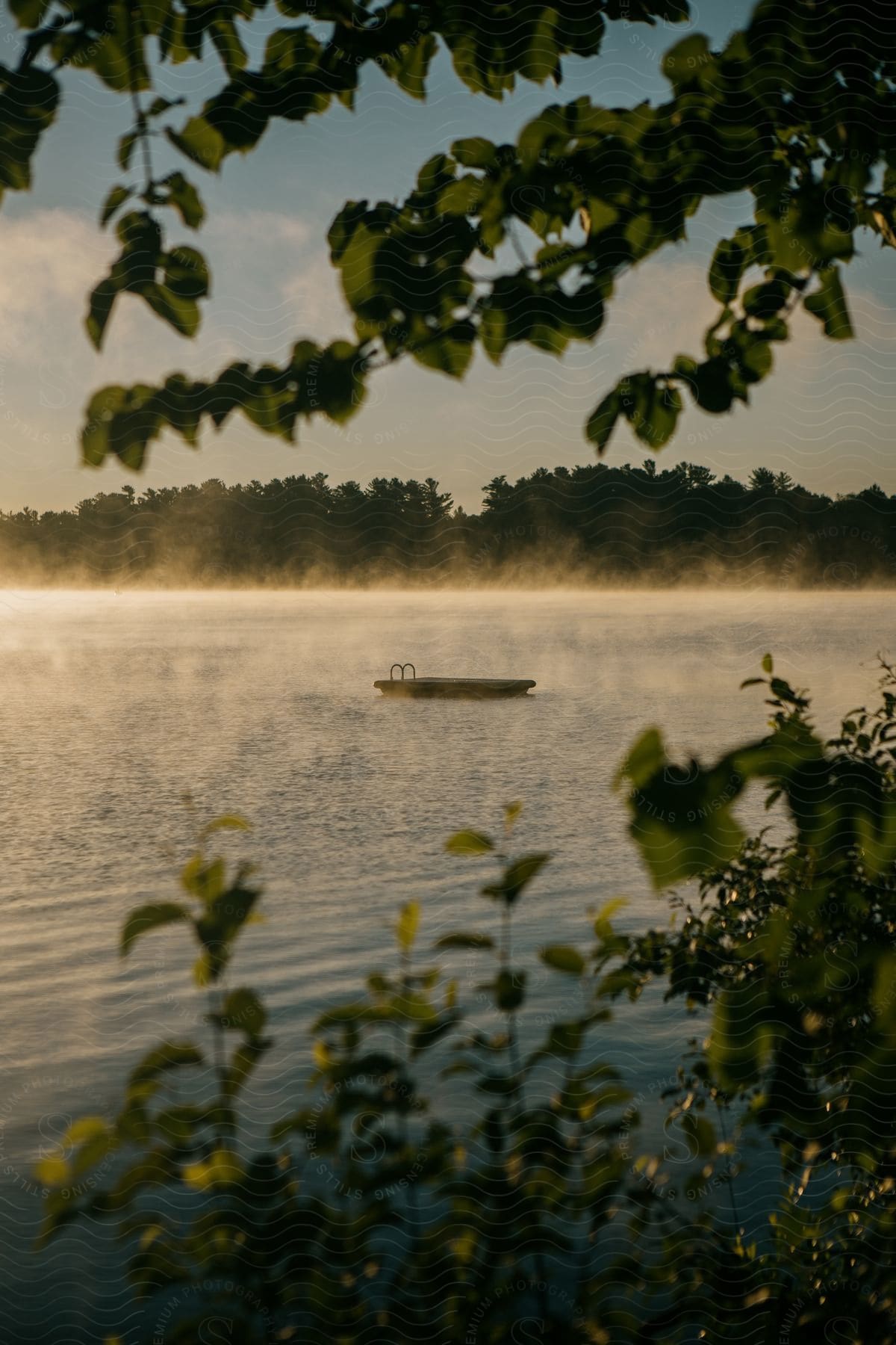 An empty boat floats in a lake