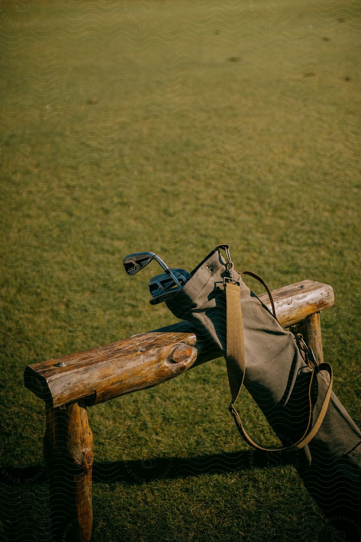 Golf clubs bag on a golf course