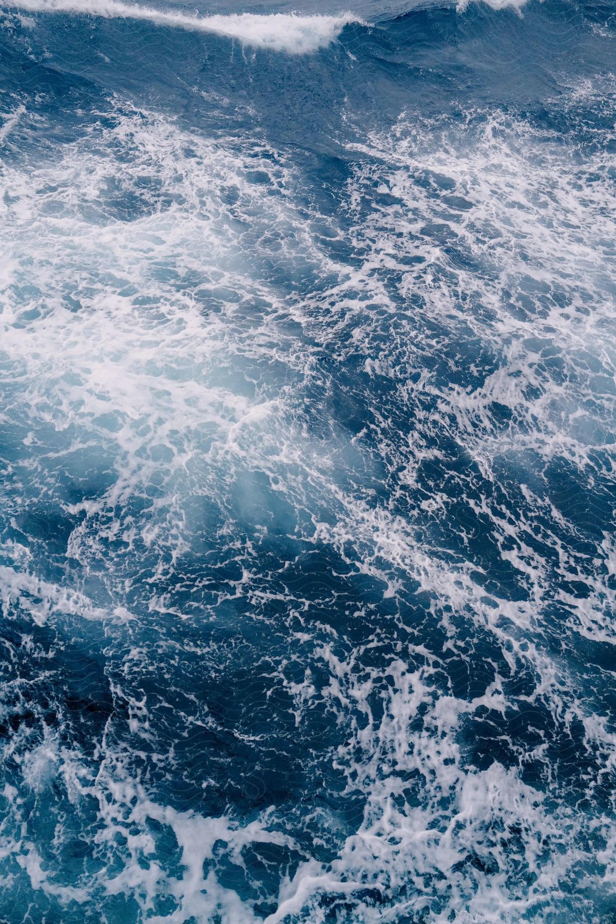 Aerial view of a sea with raging waves