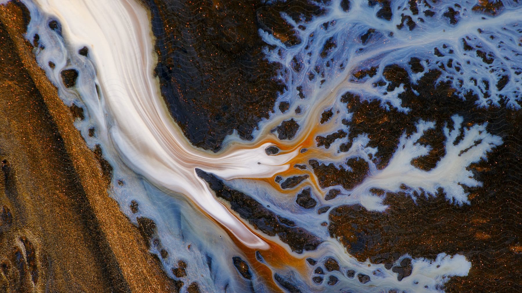 Abstract digital image featuring white water and land