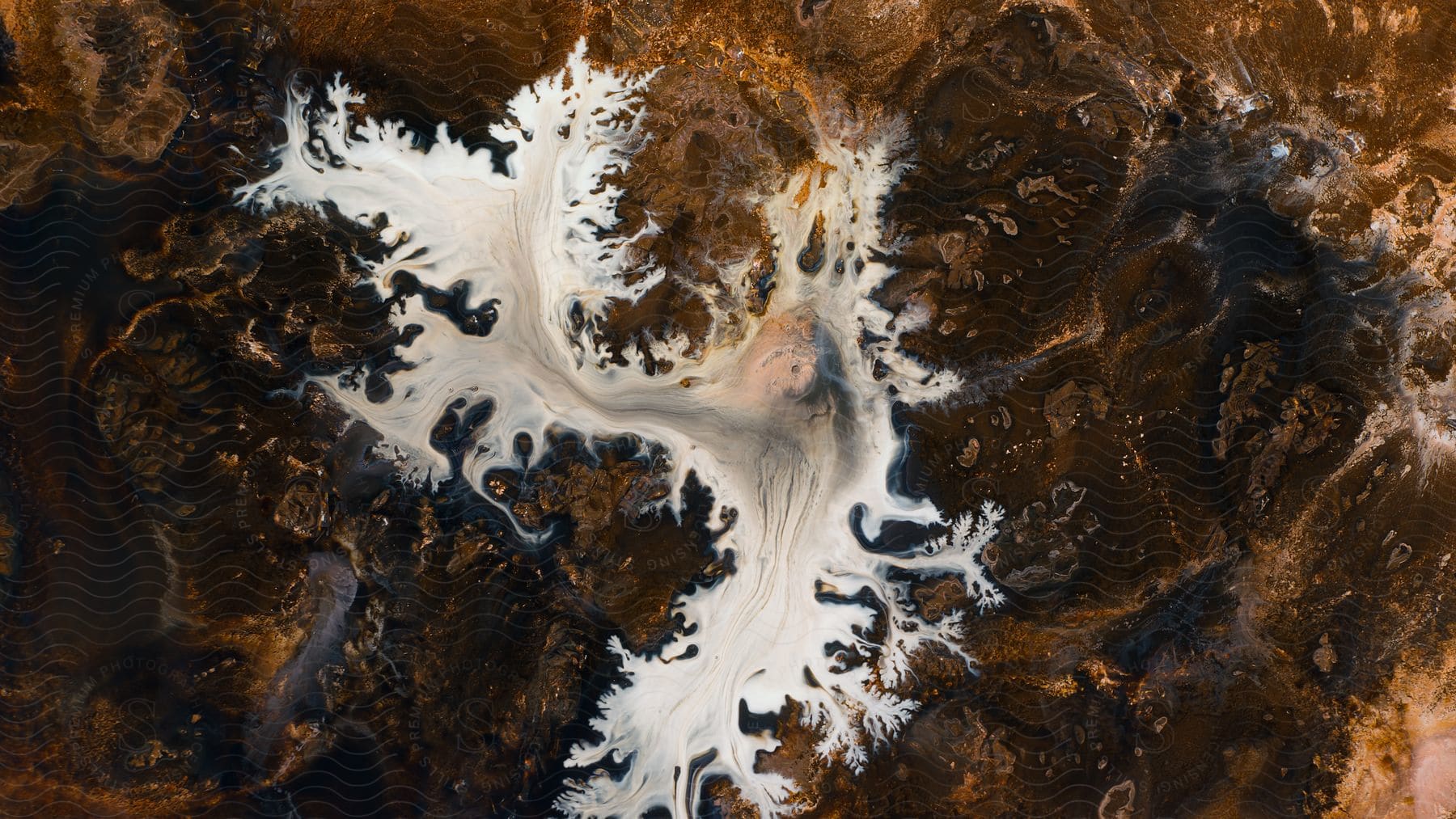 Stock photo of close up of milk splashed on top of iced coffee