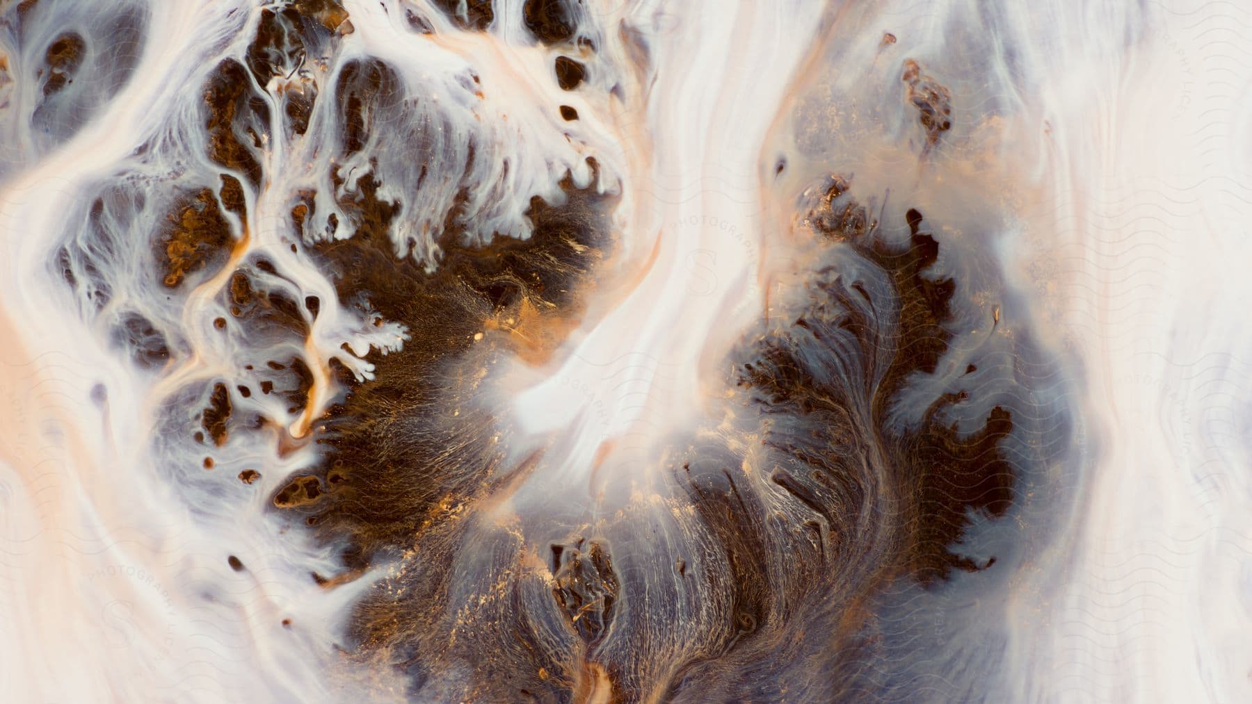 Abstract brown liquid flowing in a closeup view