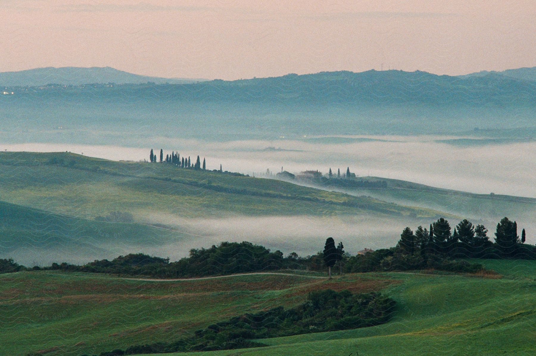 Cloudy landscape with mountains on the horizon