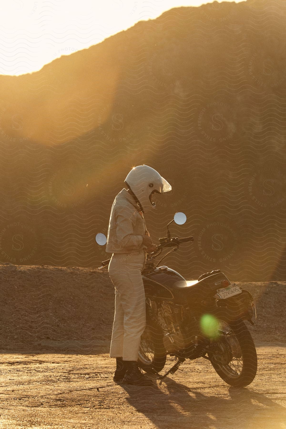 A man on a motorcycle in nature