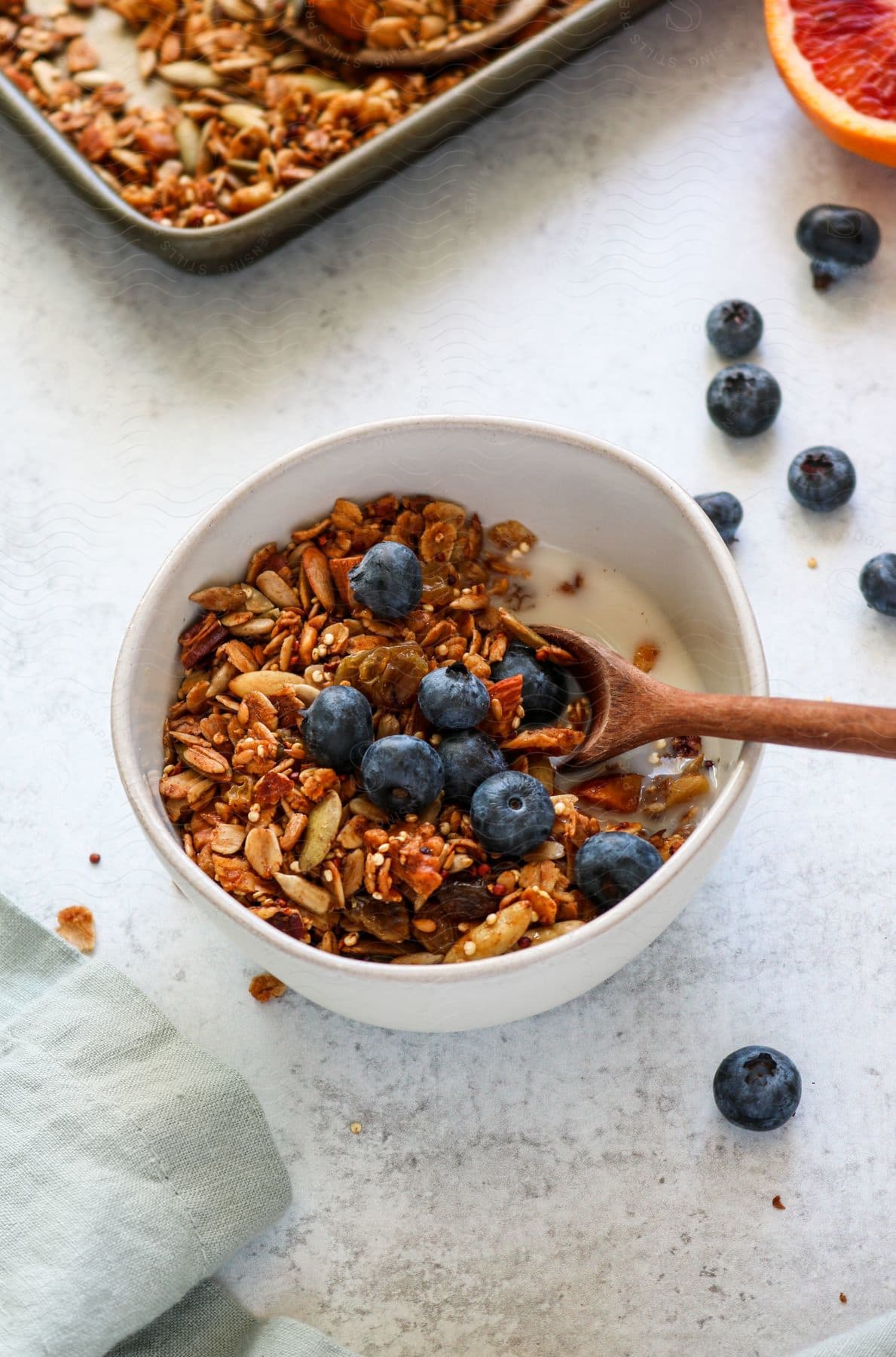 Stock photo of a bowl of granola on a table