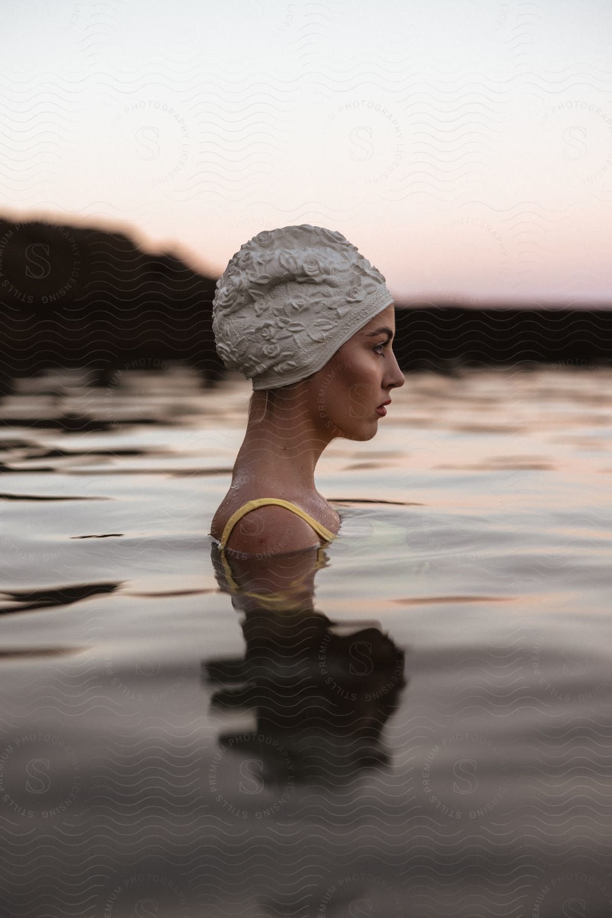 A woman swimming in a body of water