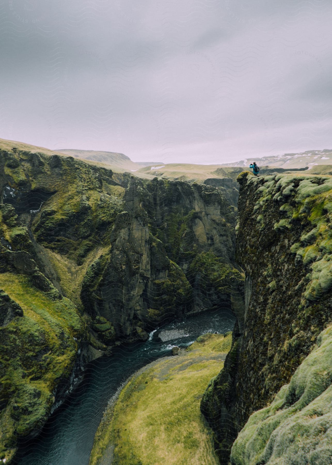 A serene landscape of mountains water rocks and cliffs in iceland