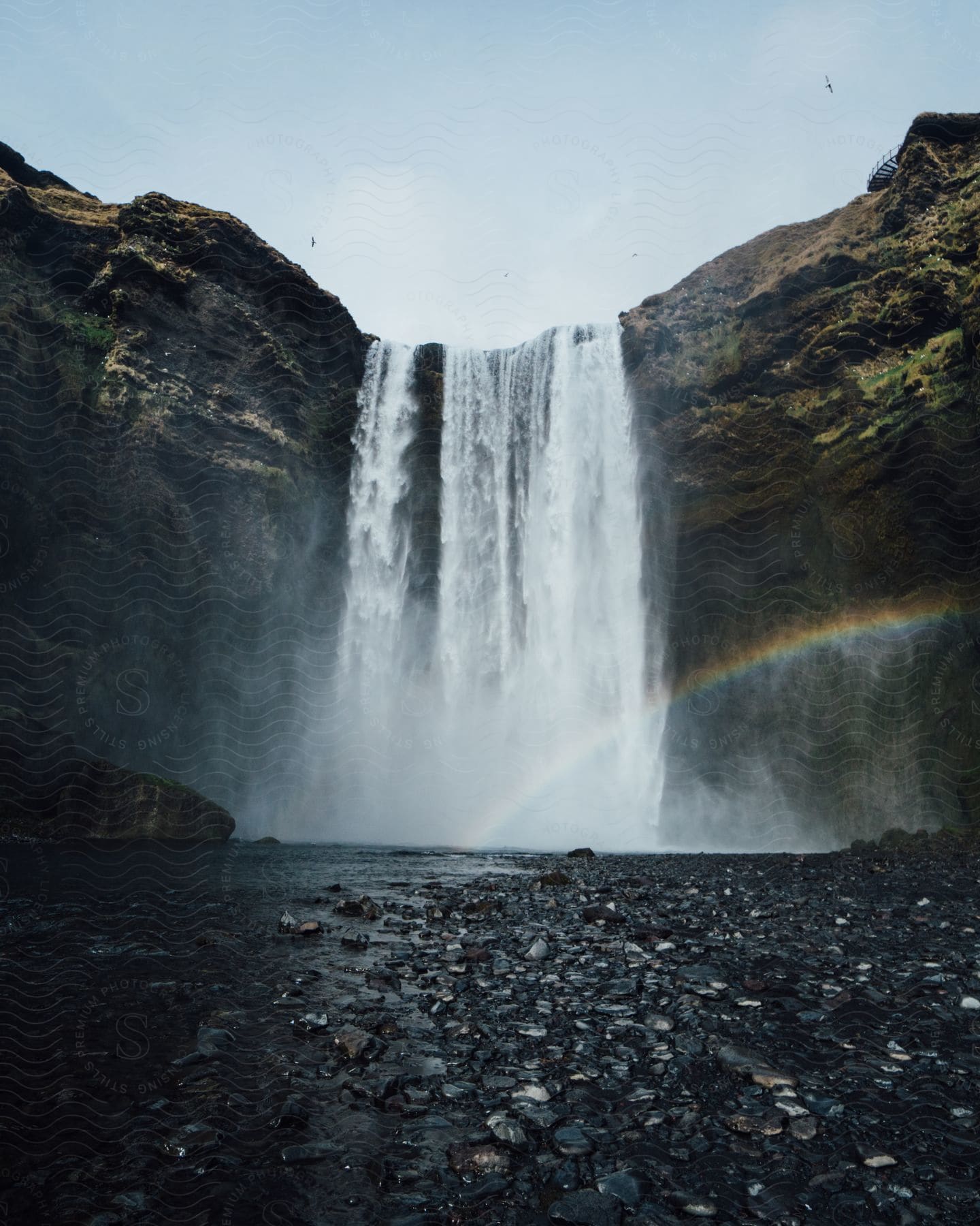 A serene waterfall in the icelandic wilderness