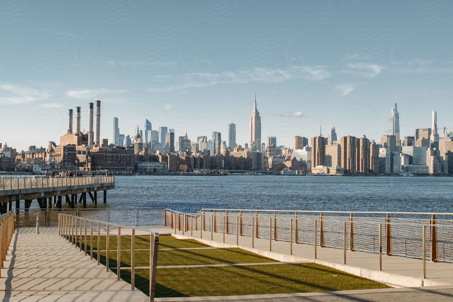 A wide river view of a big city