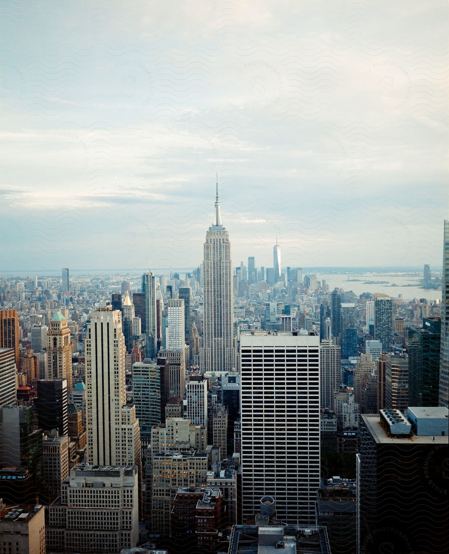 Manhattan skyscrapers recede into the distance with the empire state building at the center