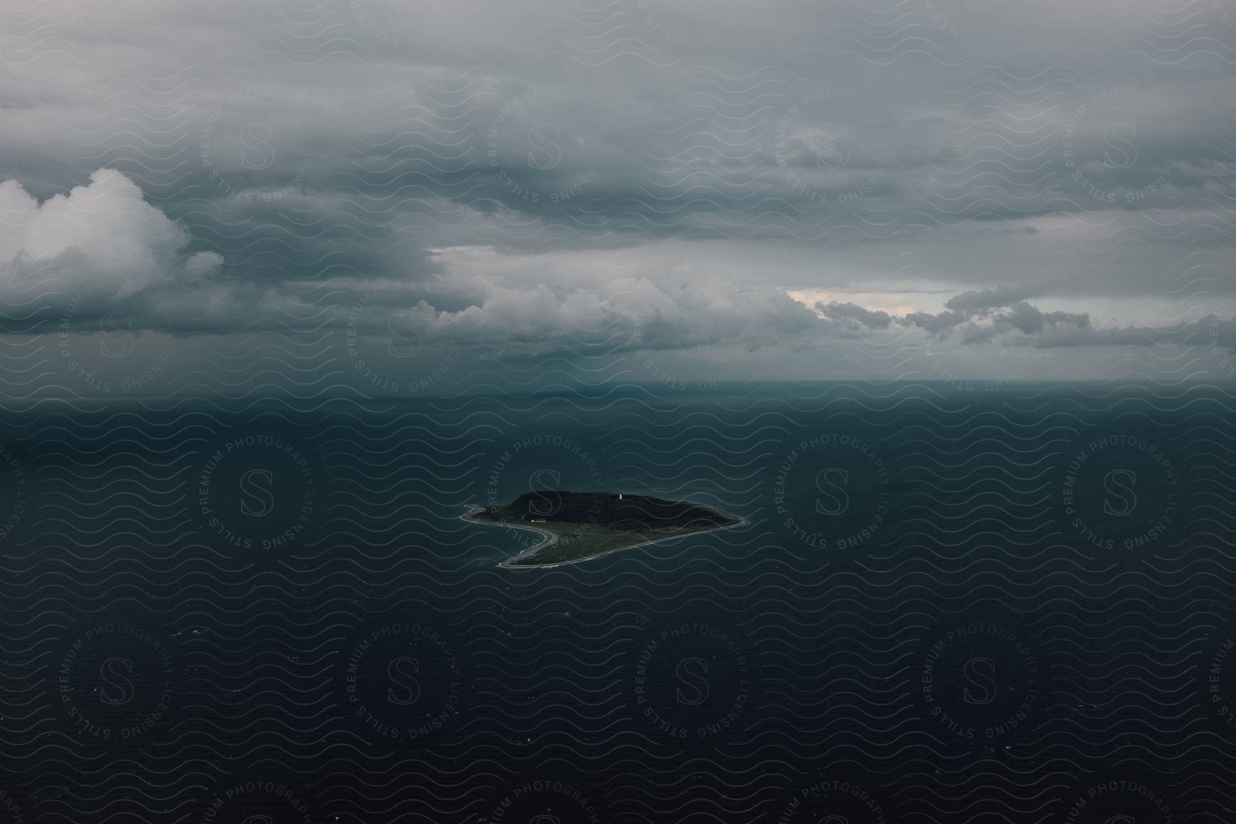 An island in the middle of the ocean seen from above