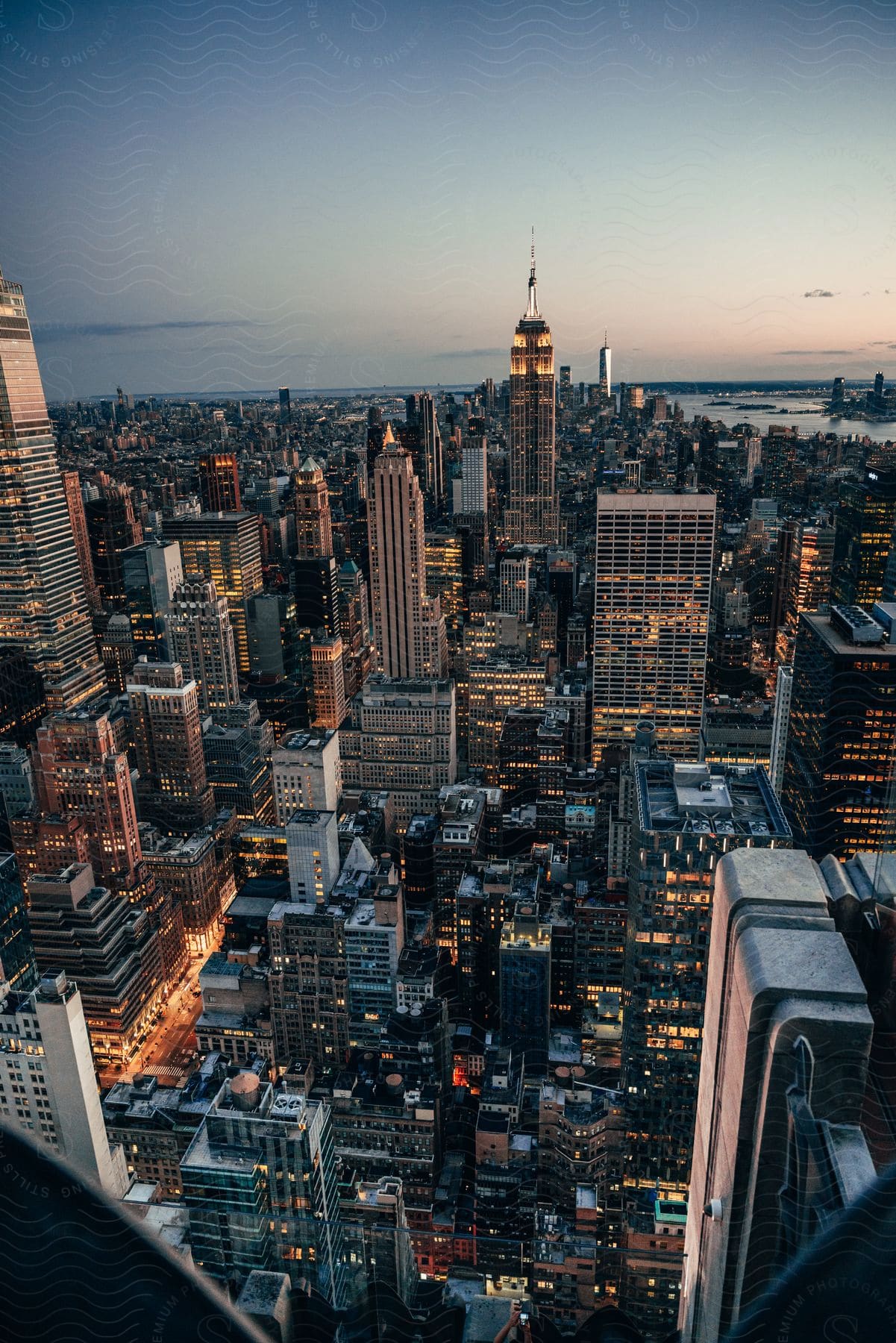 Skyscrapers dominate a bustling metropolitan city towering over smaller buildings