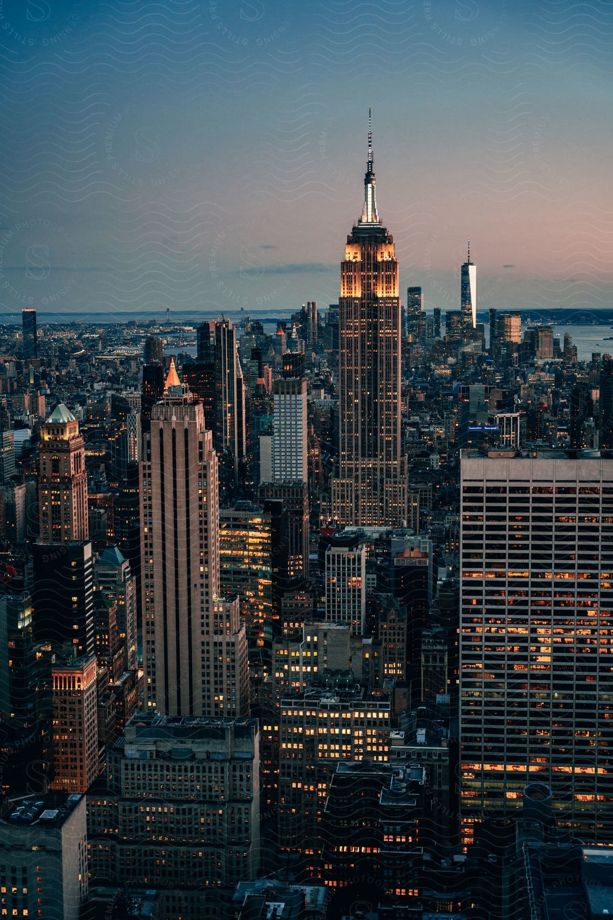 Glowing downtown with vibrant lights at sunset creating a lively cityscape in new york city