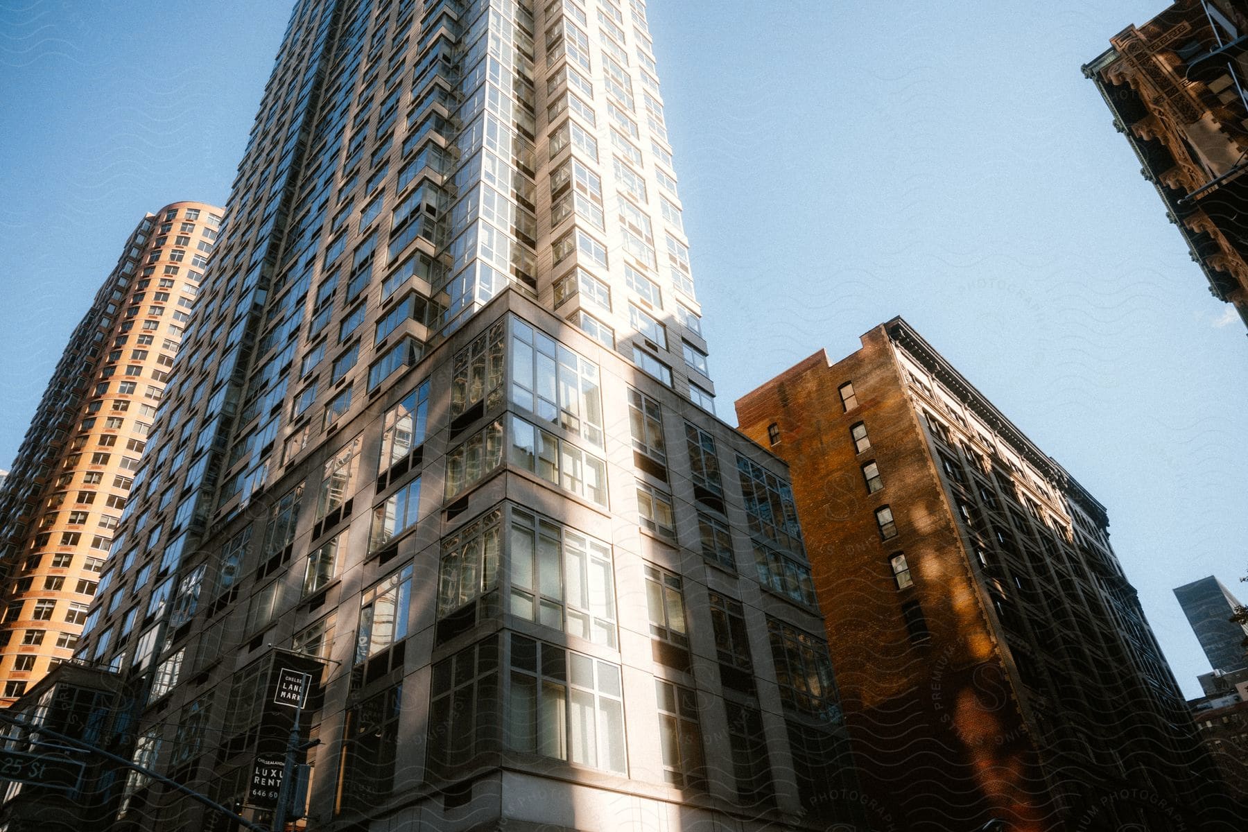 Skyscrapers in varying colors on a sunny day in new york city