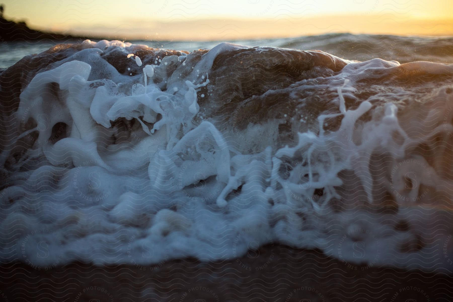 Ocean waves at dusk seen up close