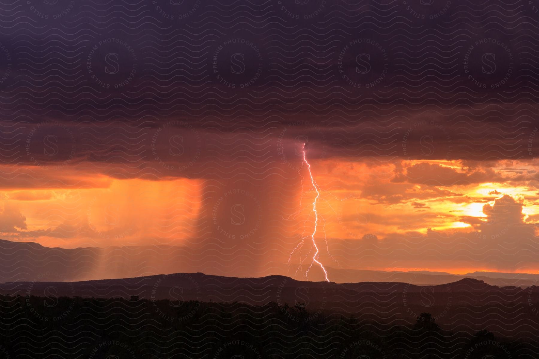 Lightning strikes in a valley during an extreme storm in arizona