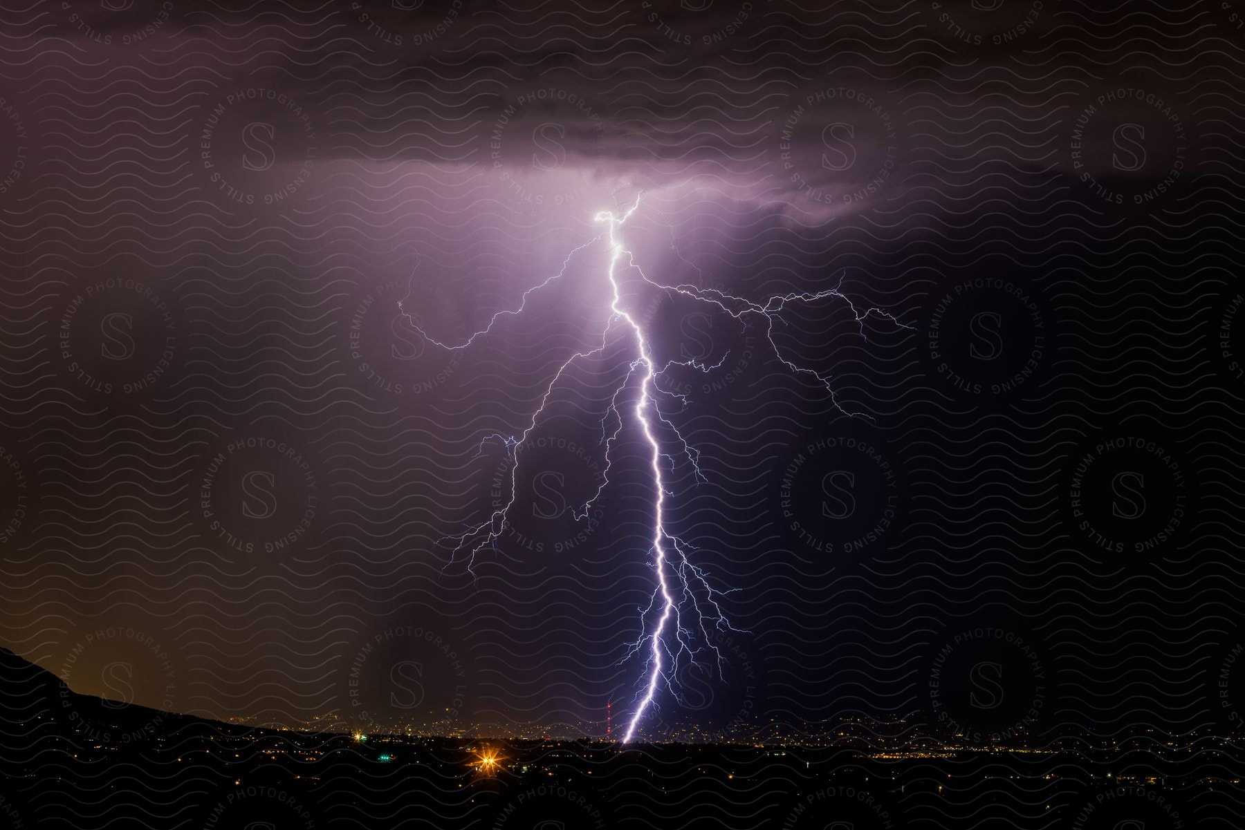 A Bolt Of Lightning Strikes A Radio Tower In Oro Valley With A Tall Streamer Visible