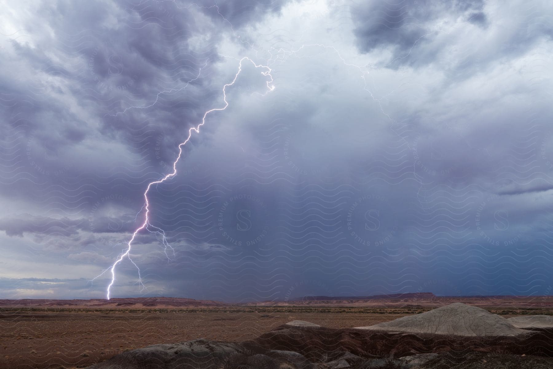 Natural landscape under a thunderstorm in arizonas painted desert plateau during the southwest monsoon