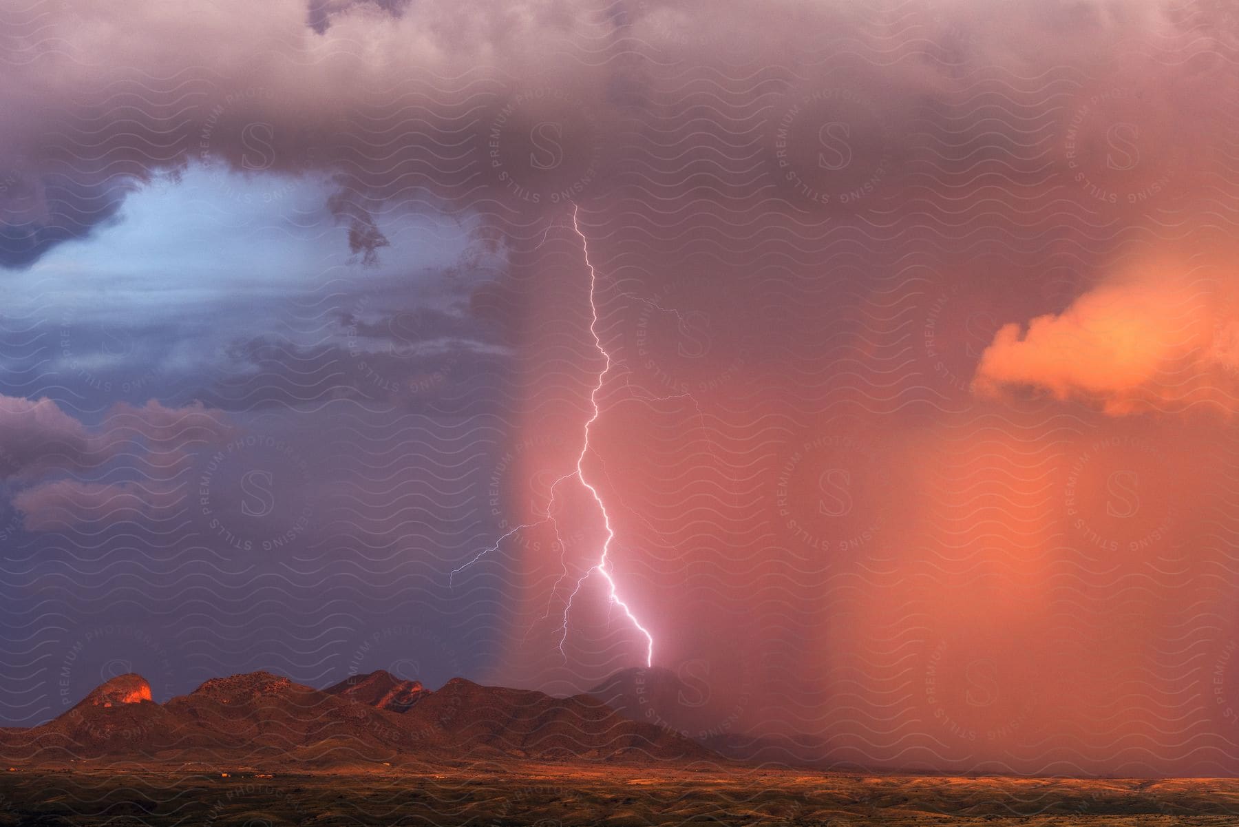 A sunset storm over the mustang mountains in southern arizona