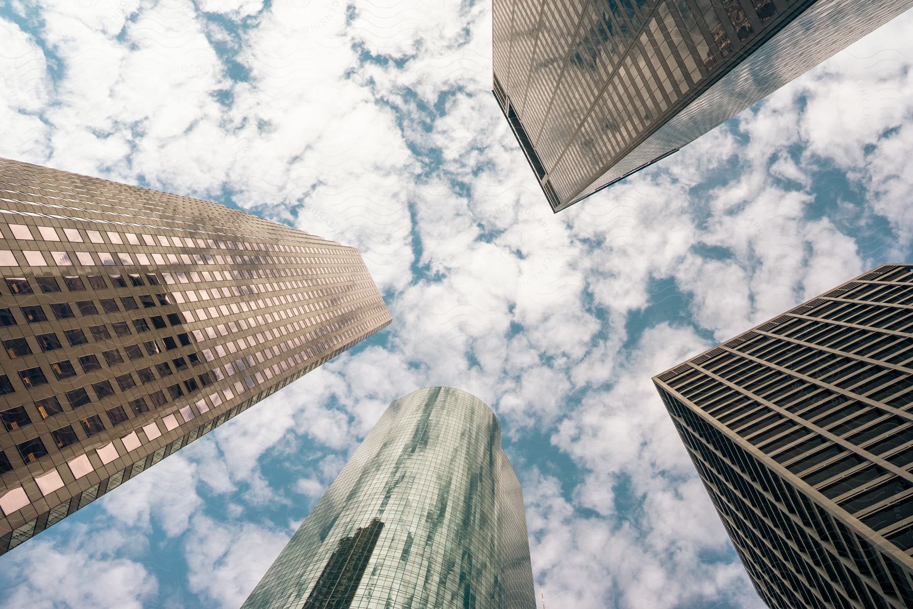 Tall buildings in a city on a cloudy day