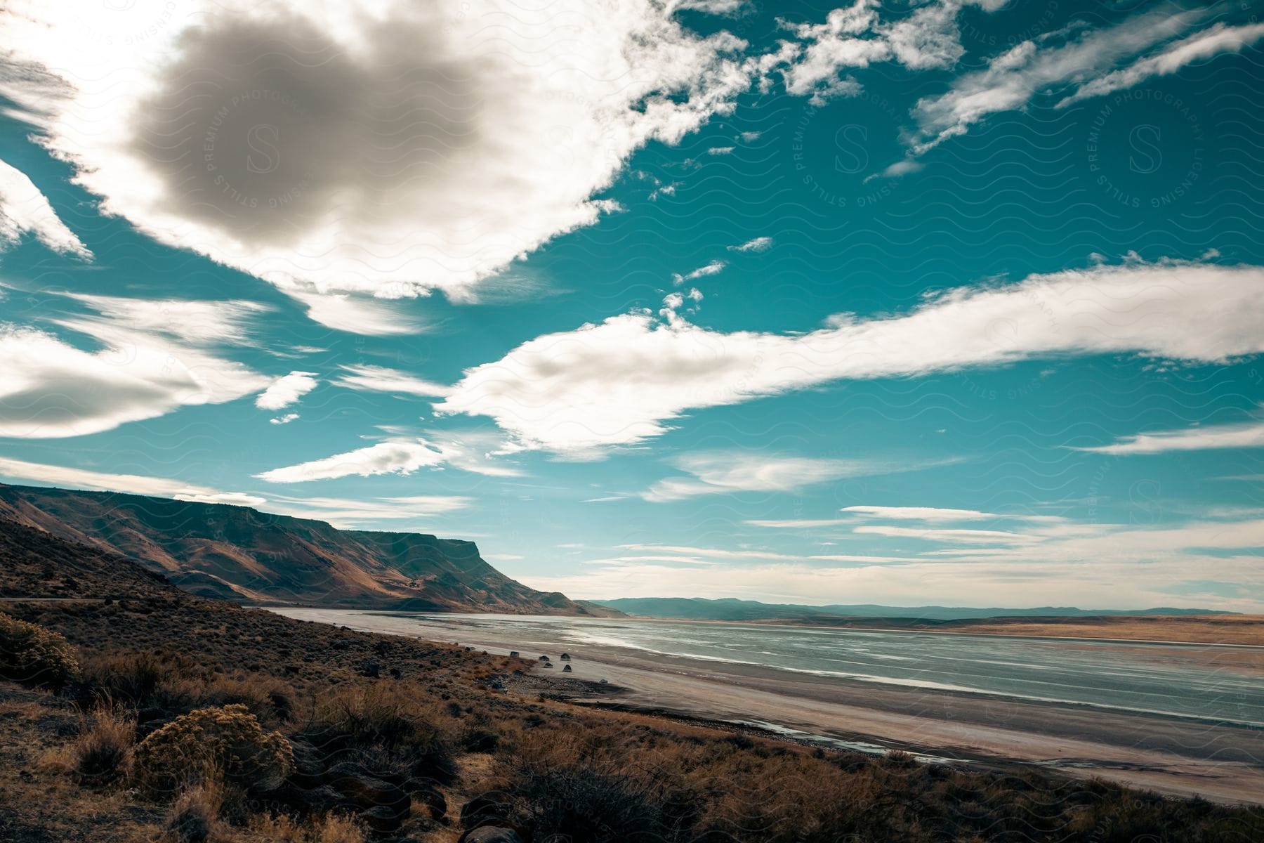 A Photograph Of A Cloudy Day At The Beach