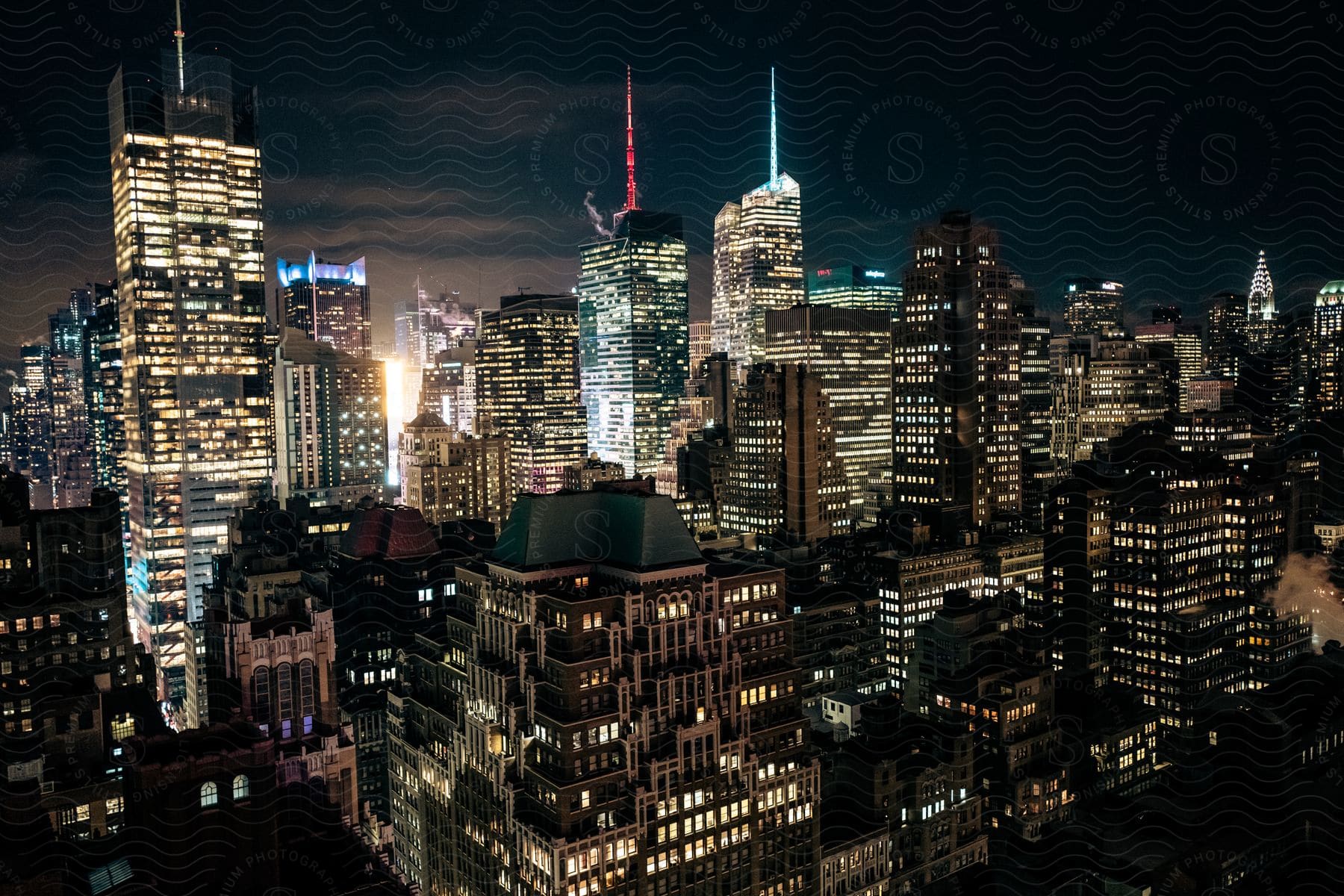 City skyline with skyscrapers and a river in the foreground