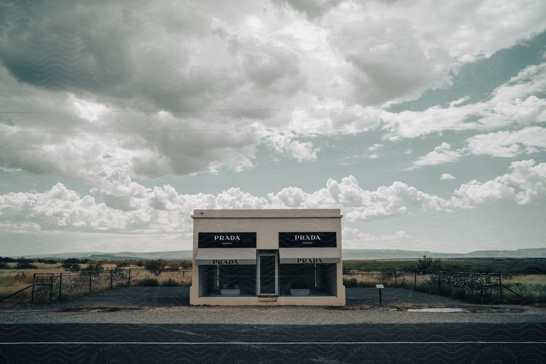 Stock photo of a prada store in the desert on a cloudy day