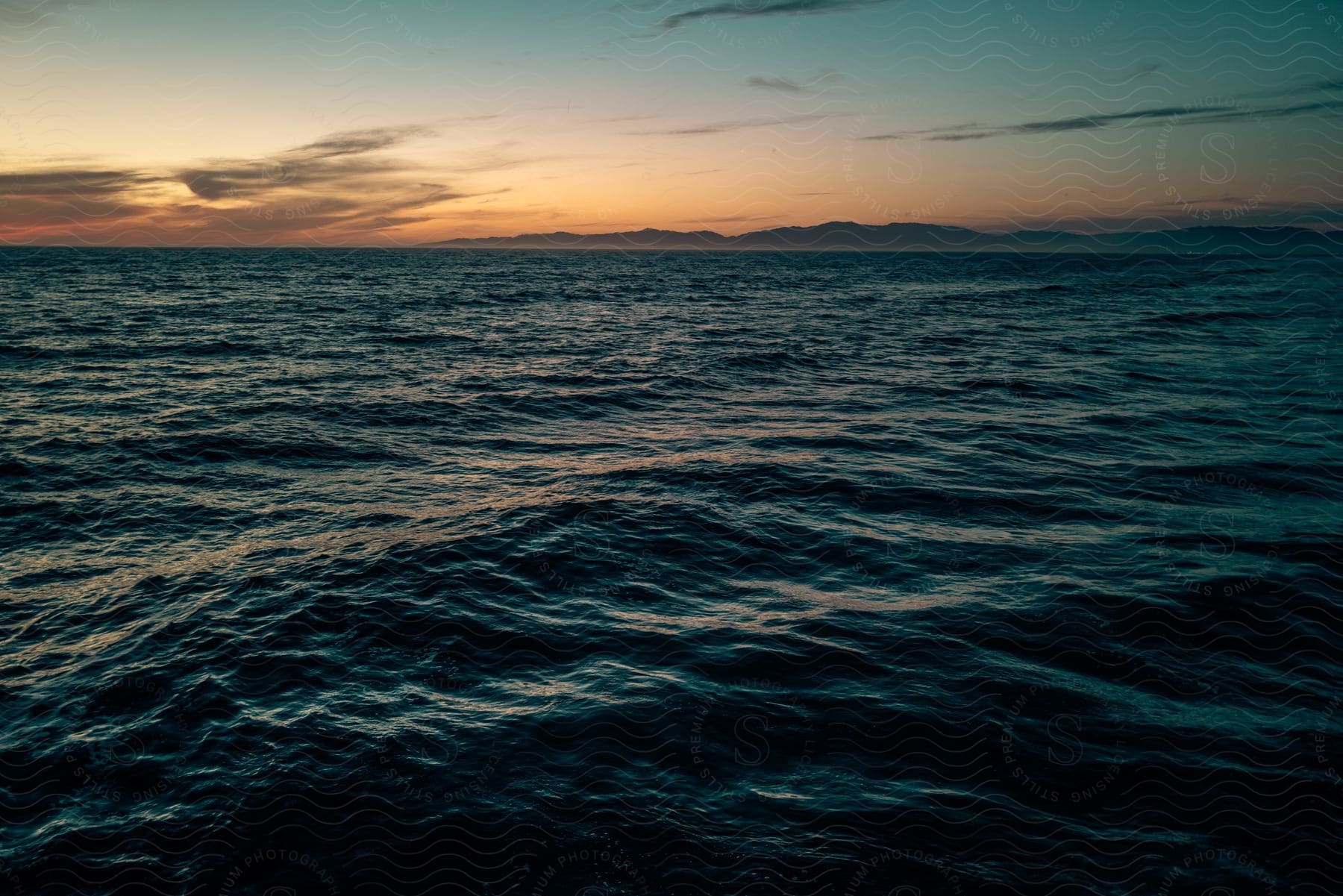 A serene sunset over a calm lake