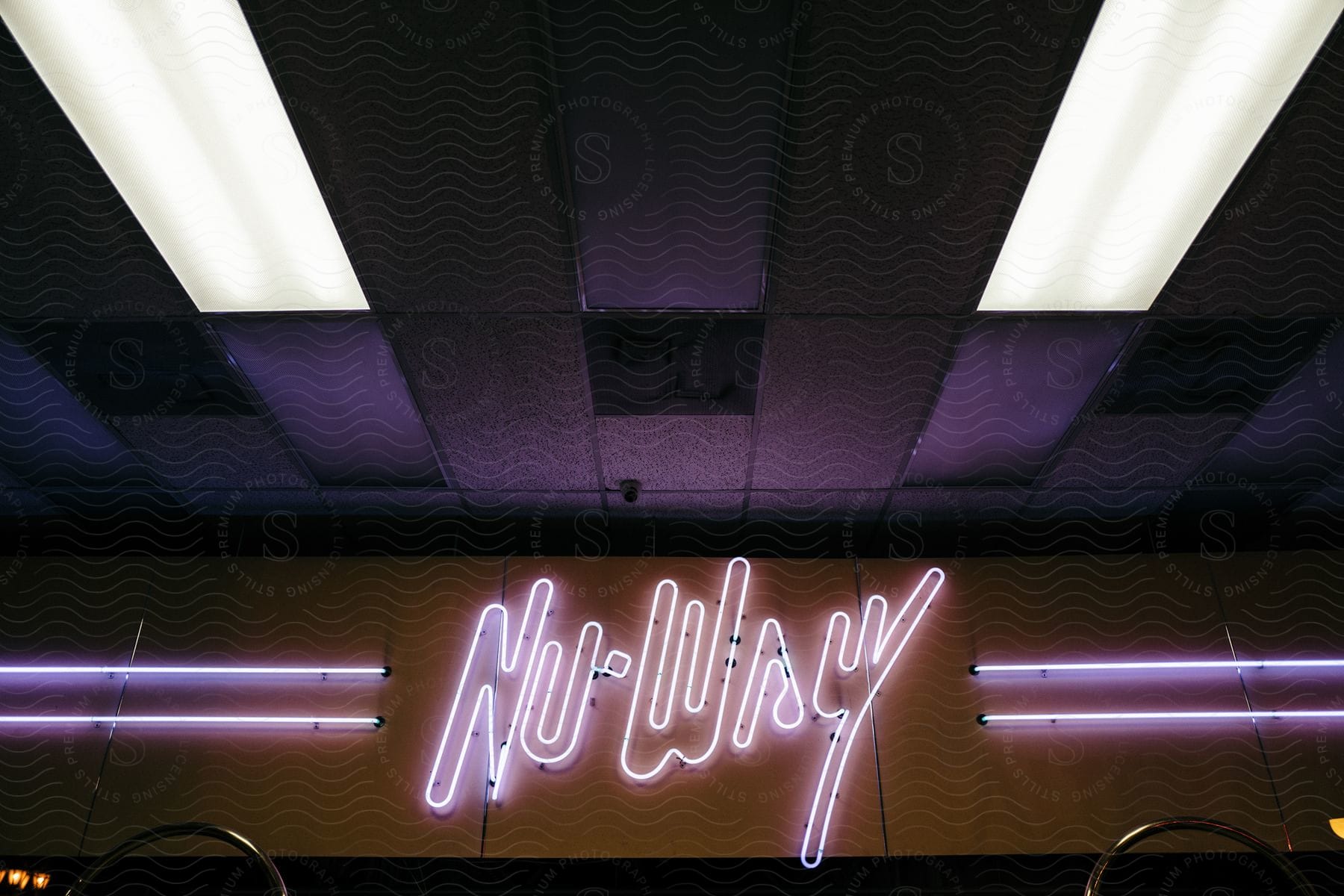 A neon sign with the words nuway displayed