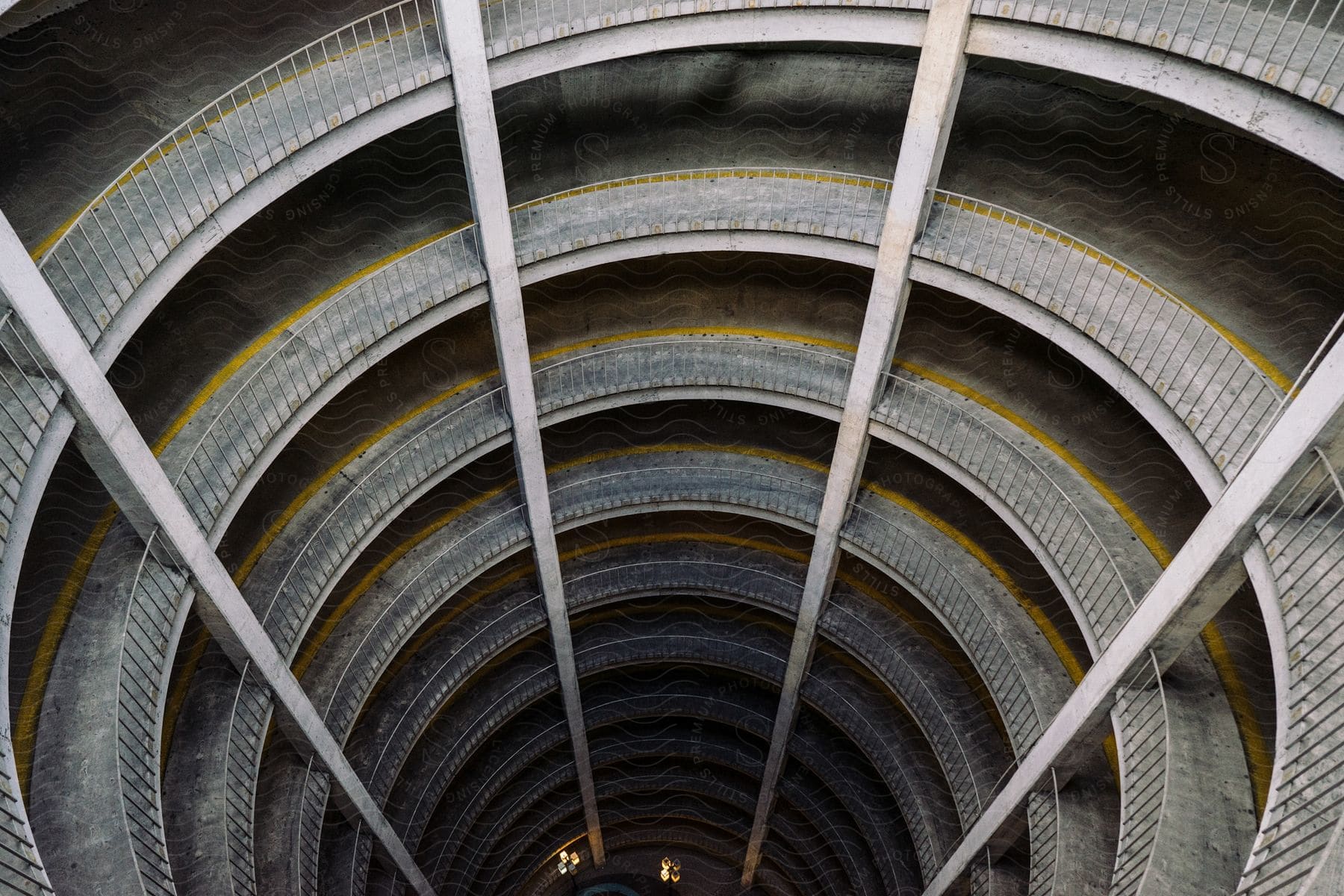 Topdown perspective of a spiral auto ramp in a parking garage