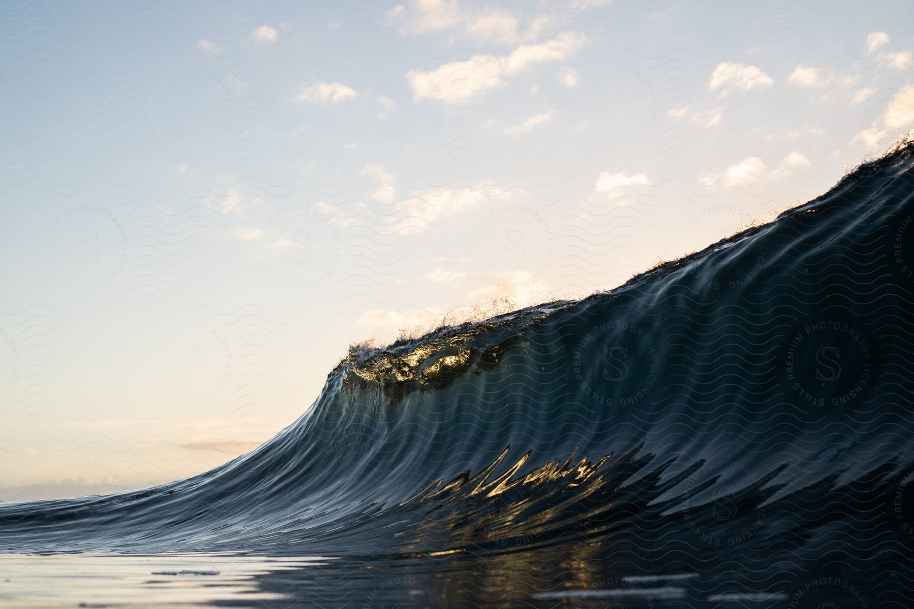 Ocean waves crashing against the shore with various shapes and textures