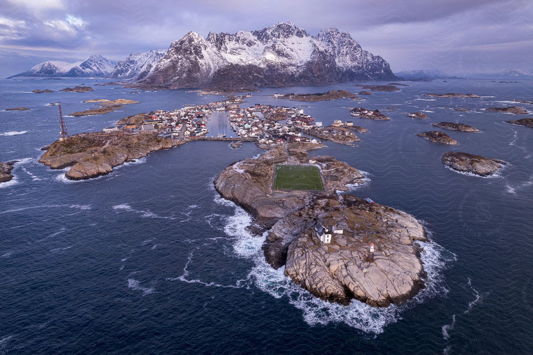 The buildings of a small town are scattered across the islands