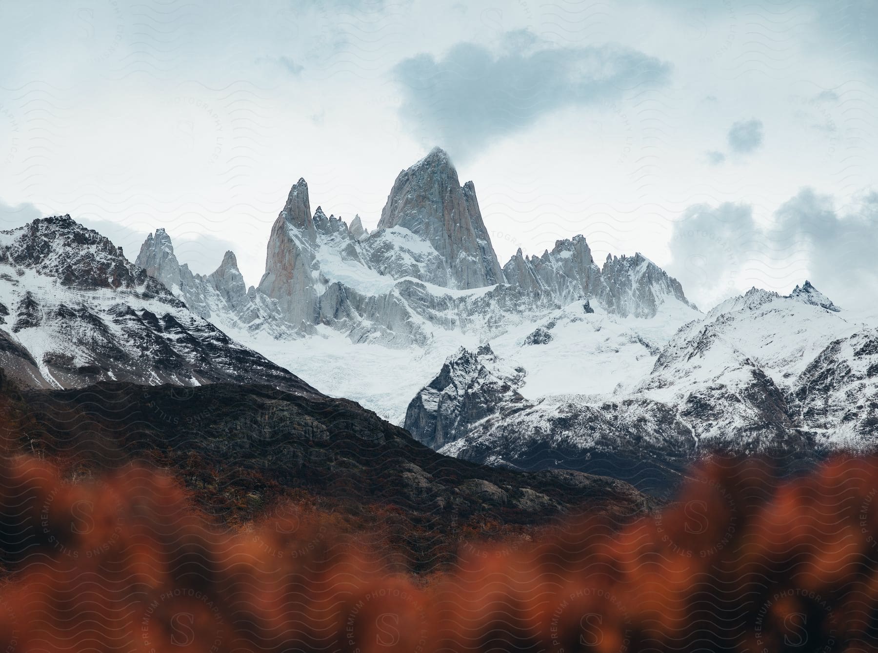 Snowcovered mountain ridge under a cloudy sky in patagonia