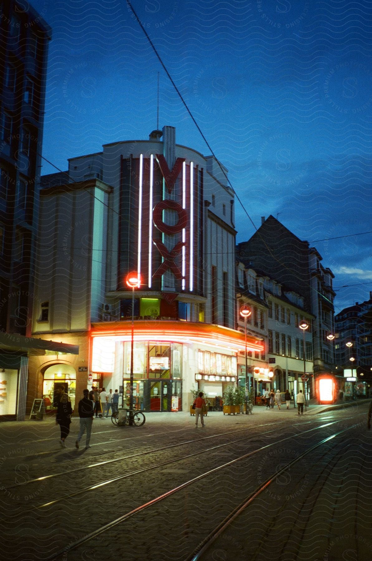 Exterior of cinéma vox movie theater captured at dusk