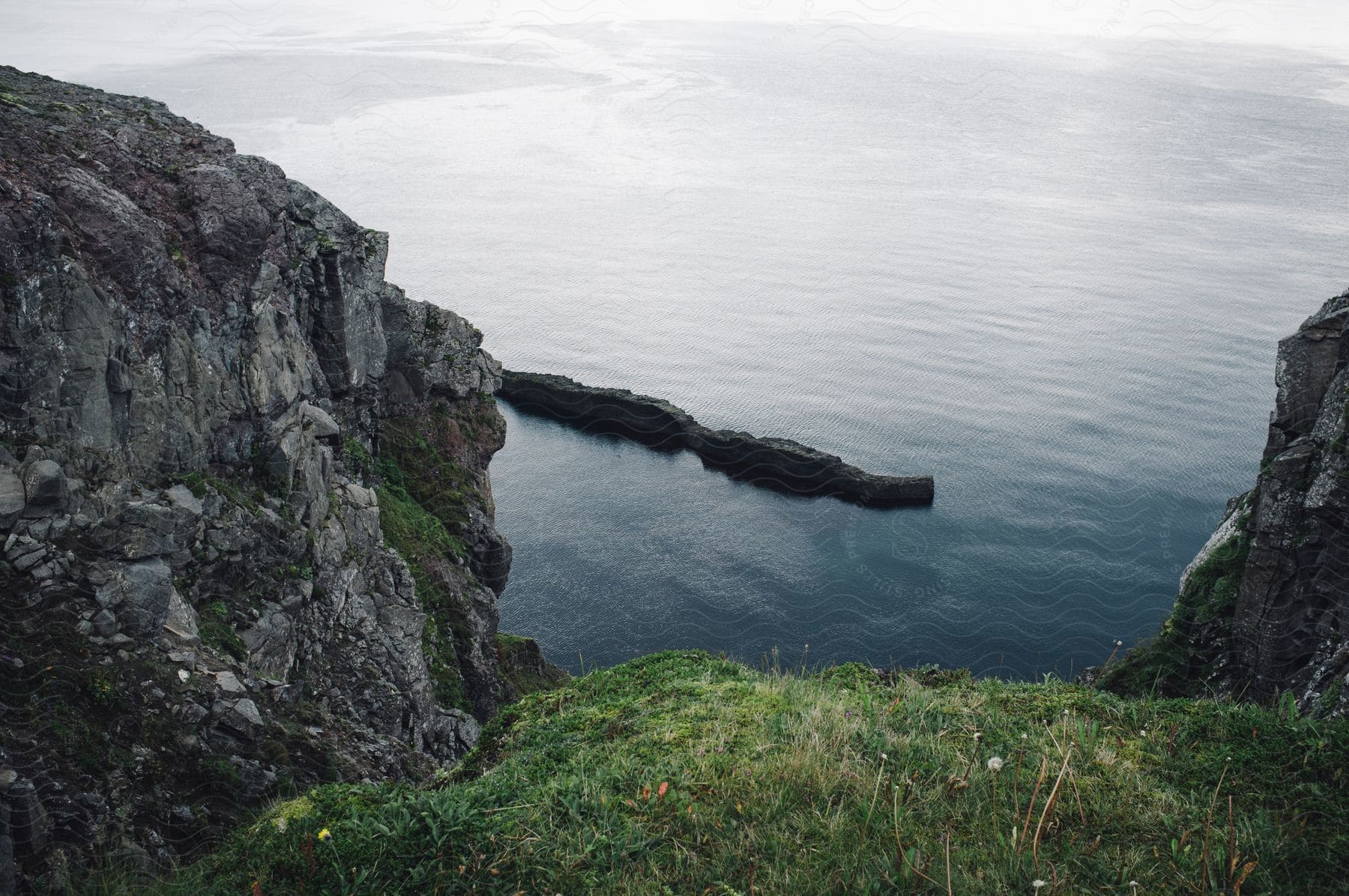 Steep rocky coastal ocean shoreline